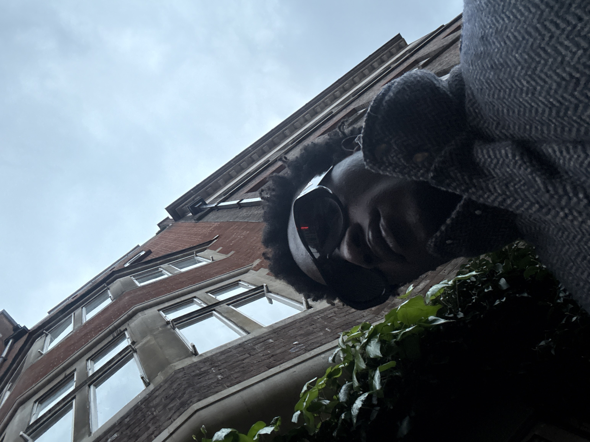 Person with headphones spotted in London street scene