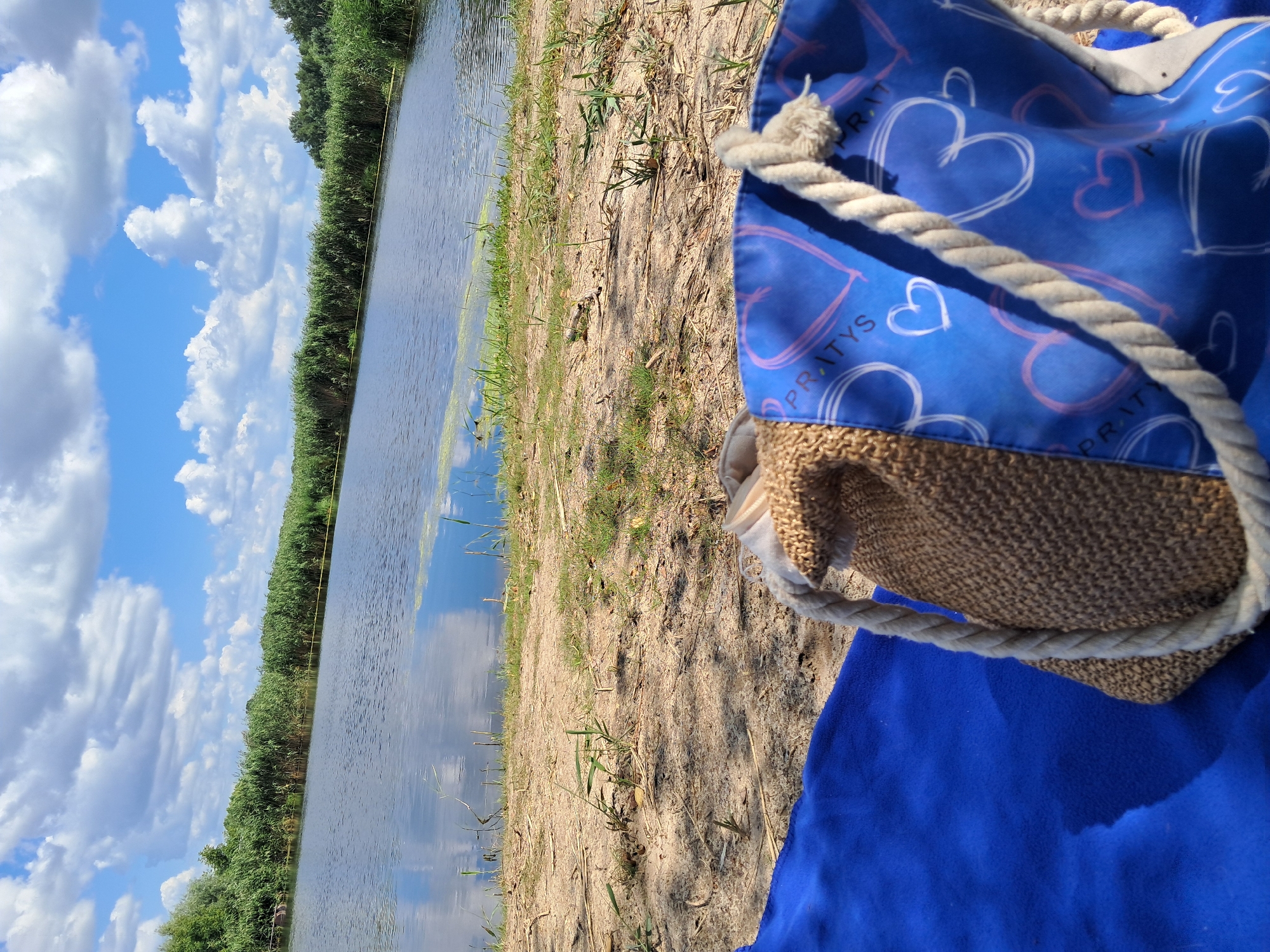 Lazy summer morning on the Dnipro riverbank in Kremenchuk