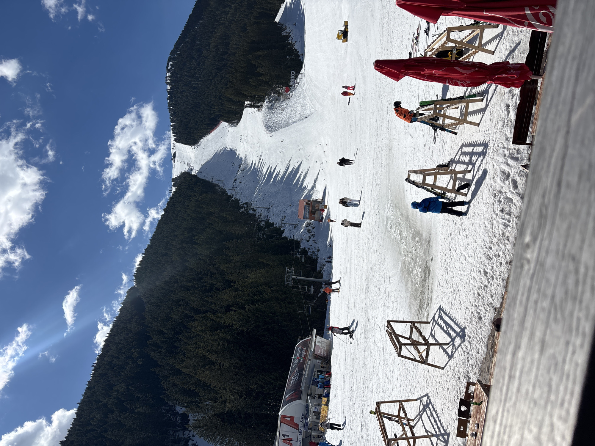 Sunny day skiing scene captured at Bansko resort
