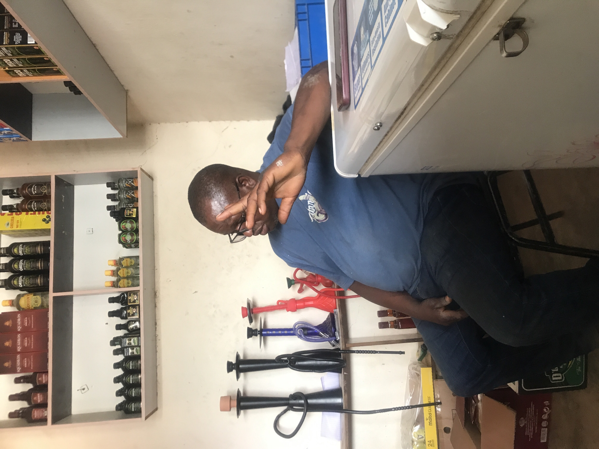 Man spotted shopping in retail store in Kabong, Nigeria