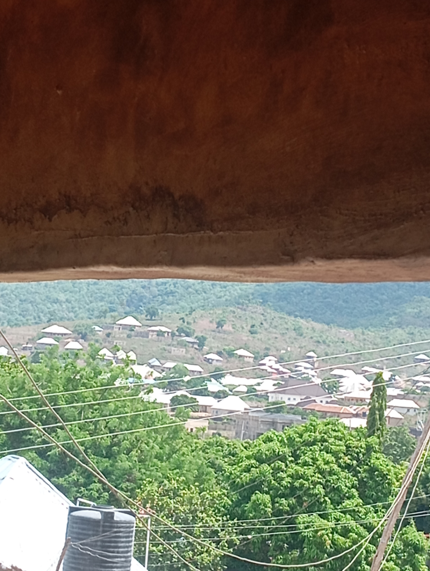 Hillside residential community documented from multiple perspectives over 10 minutes