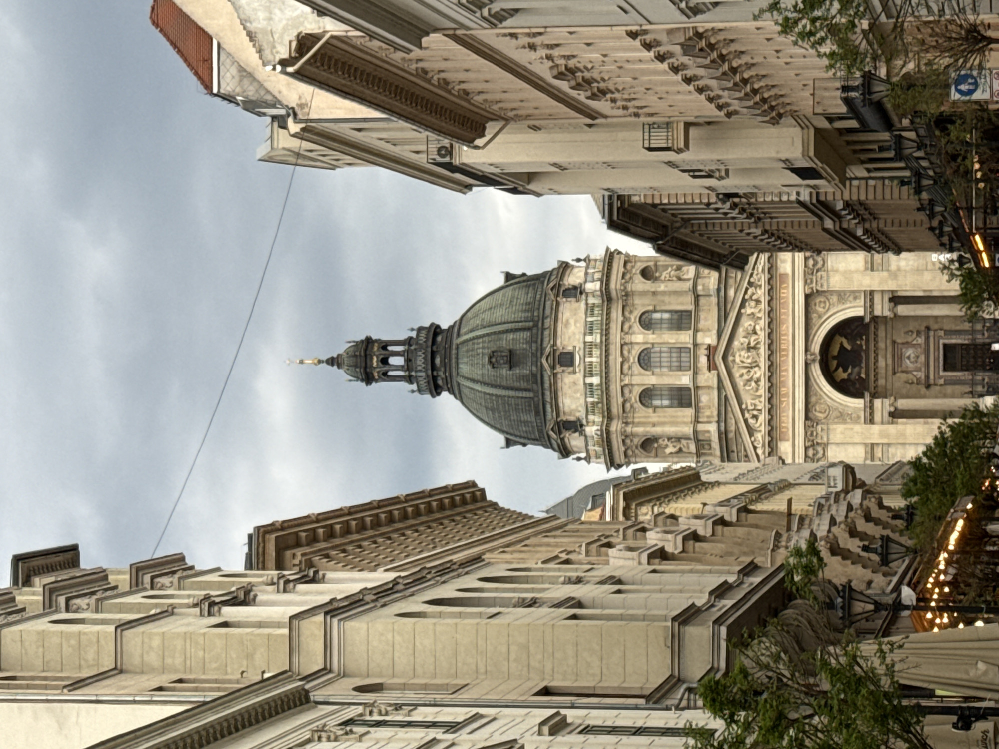 Tourist captures street views of St. Stephen's Basilica, Budapest