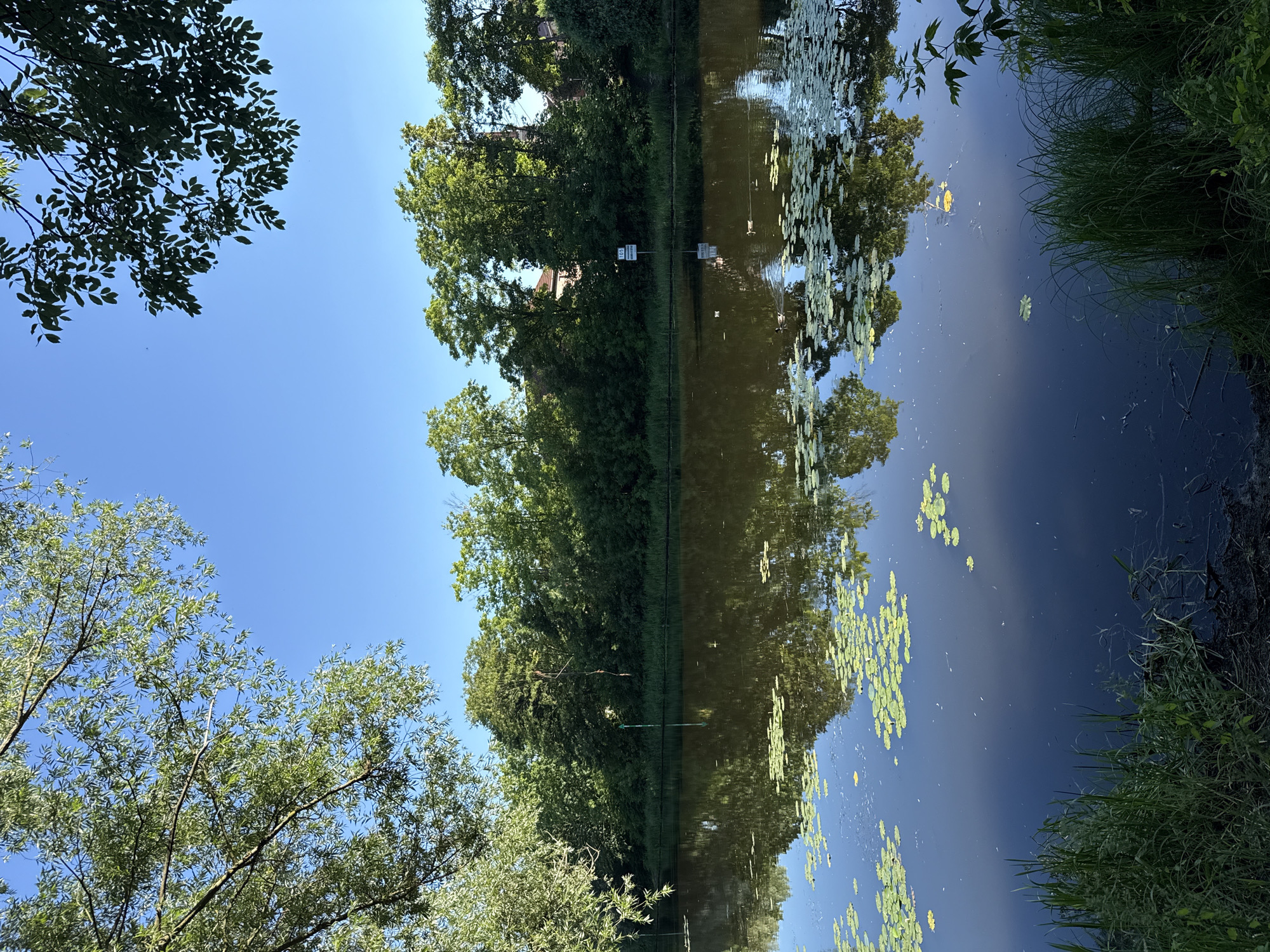 Sunny afternoon along Rathenow's canals, parks, and gardens