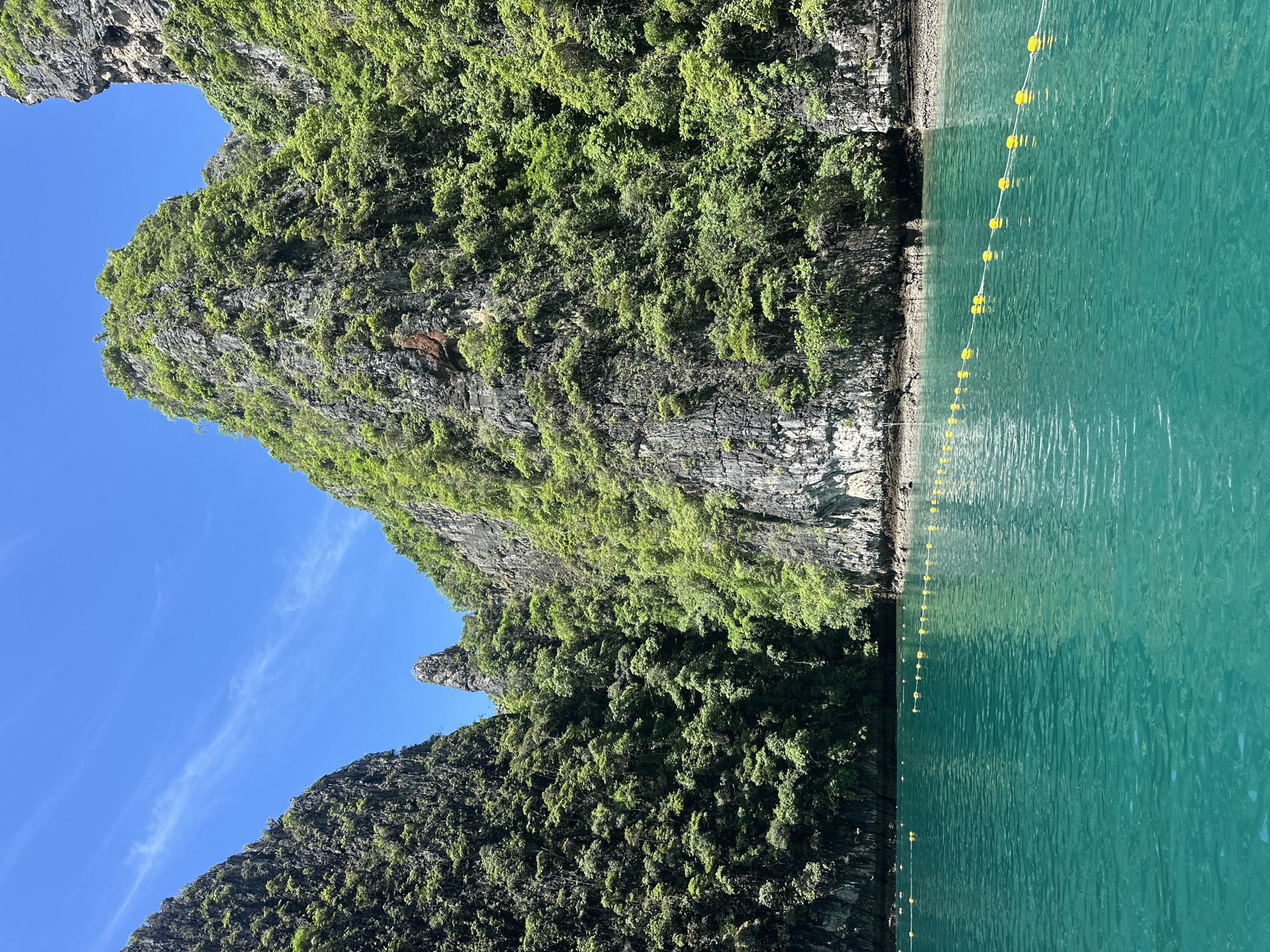 Towering limestone karsts off the coast of Haad Yao, Thailand