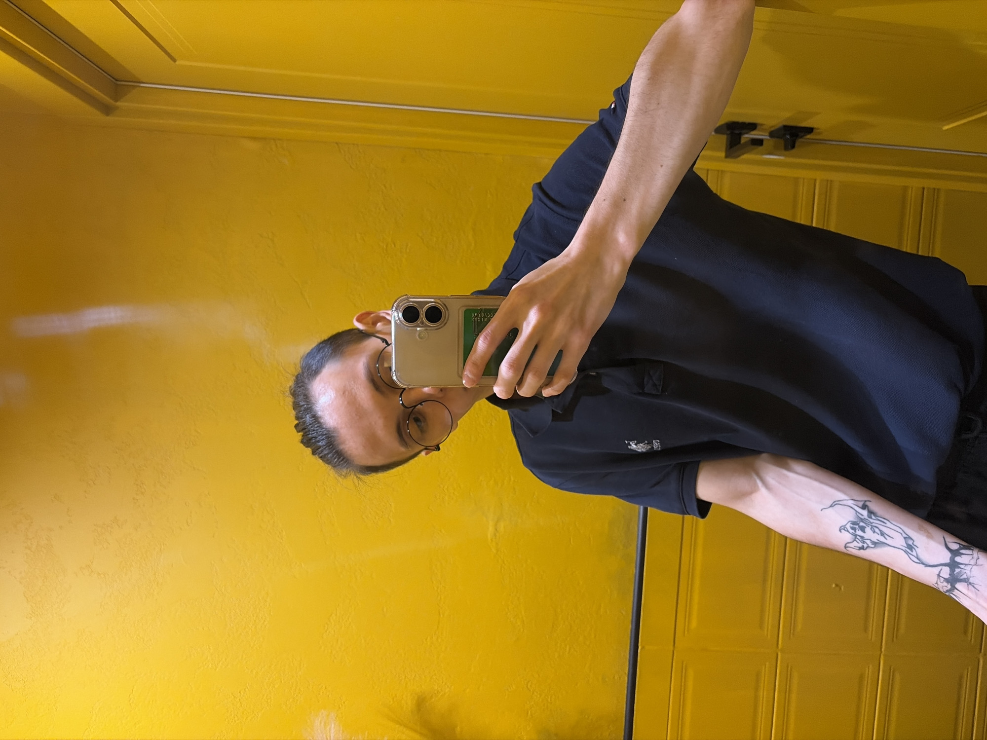 Selfie session and fish painting, yellow wall setting