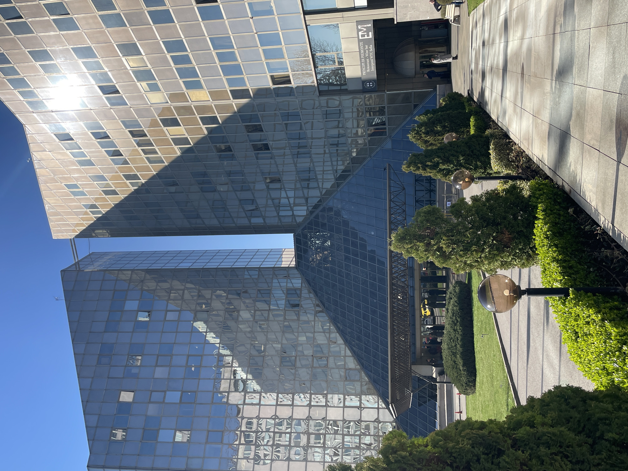 Modern glass buildings and pedestrian areas documented in Sofia