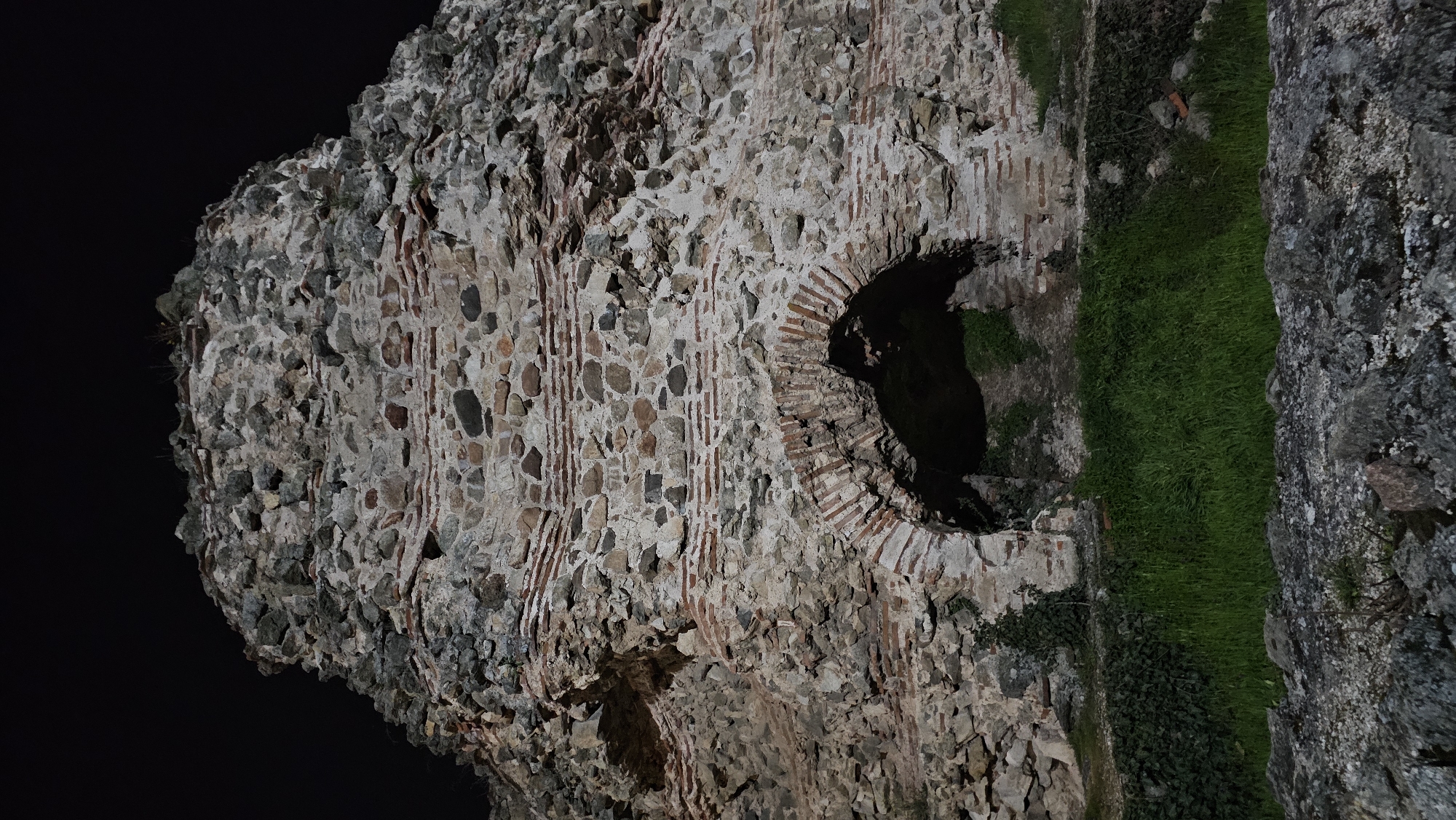Nighttime views of ancient Roman ruins in Hisarya