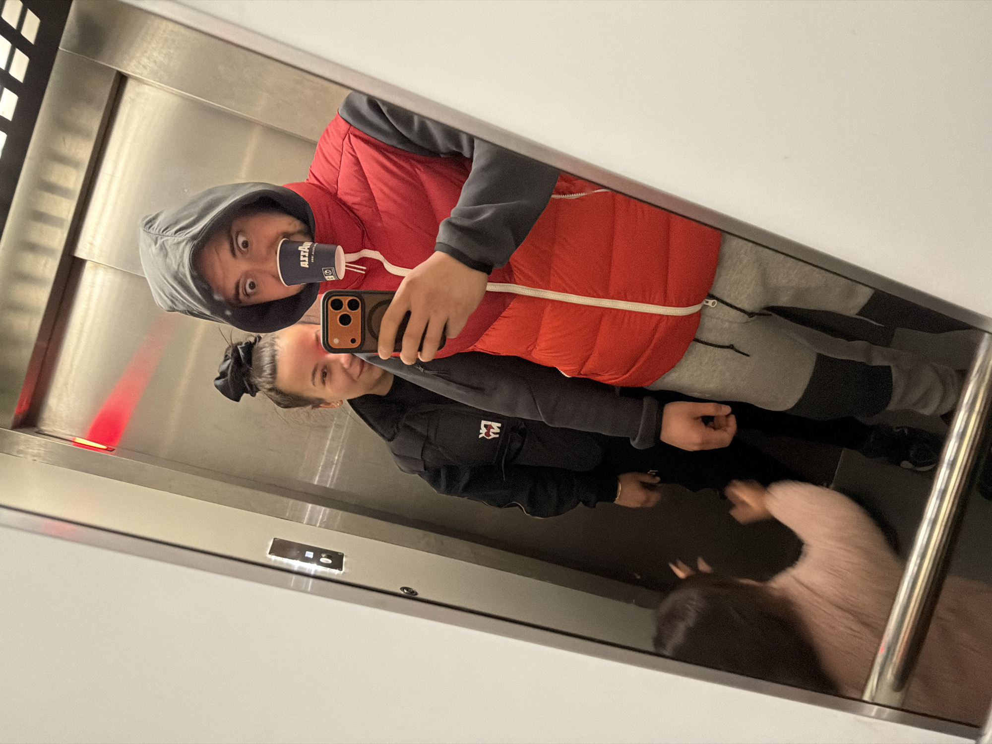 Family takes elevator selfie in brief recorded moment