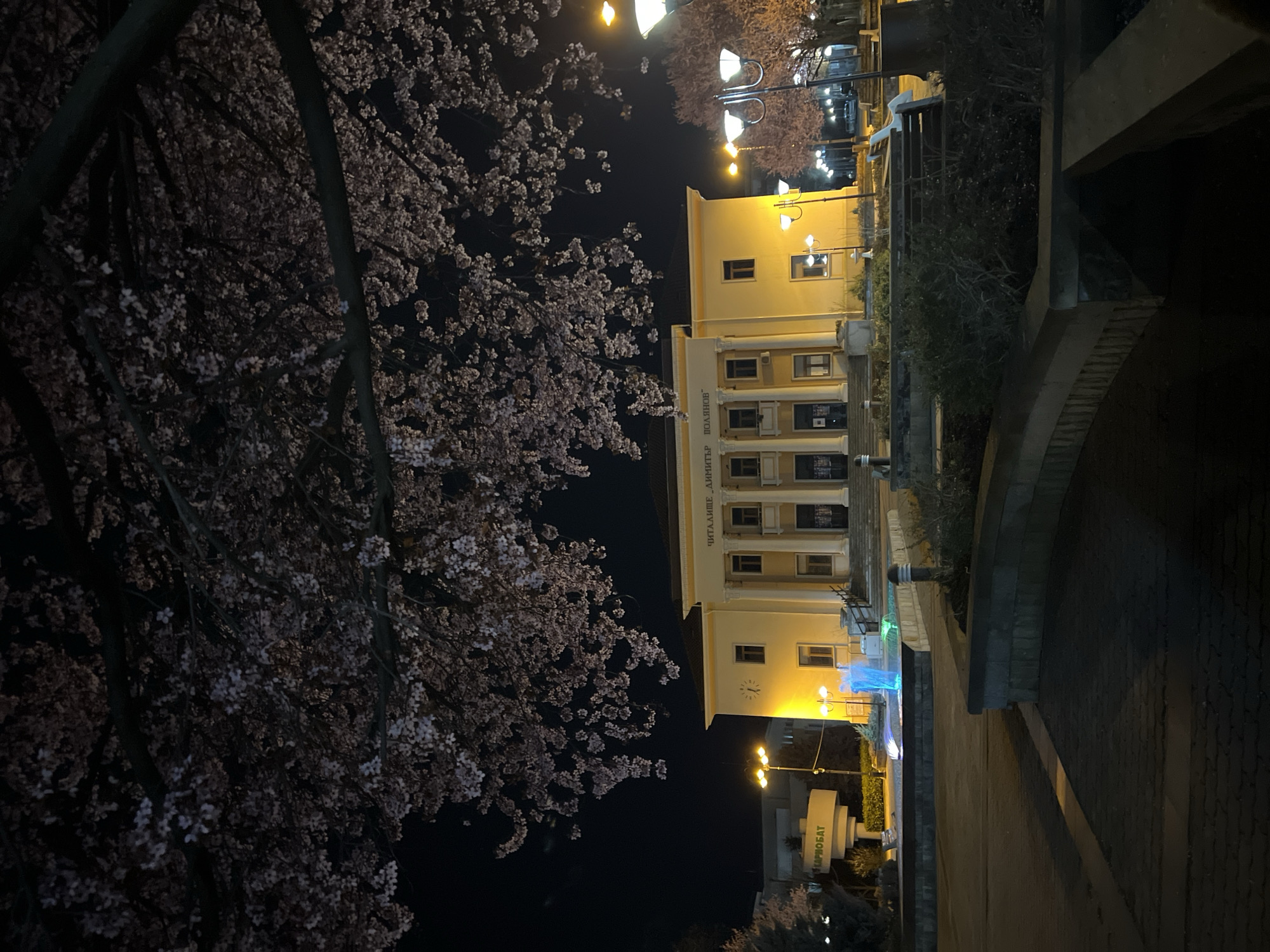Cultural center illuminated at night in Karnobat, Bulgaria