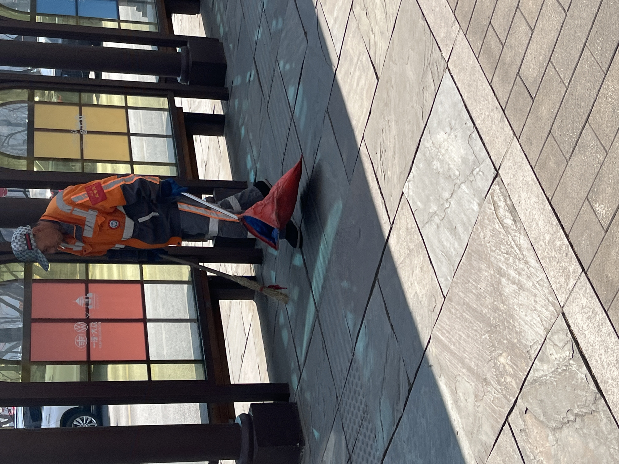Workers and pedestrians observed at Changchun bus stop