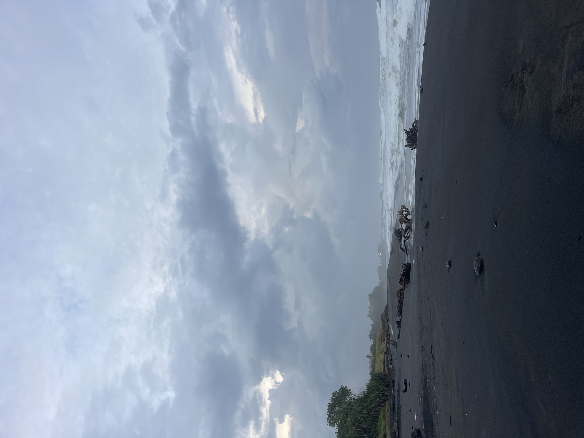 Evening coastal scenes documented in Kediri, Indonesia under overcast skies