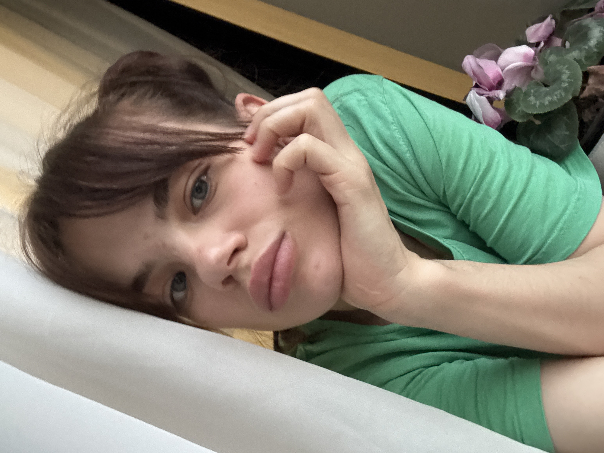 Woman rests indoors in Rostov-on-Don residential area
