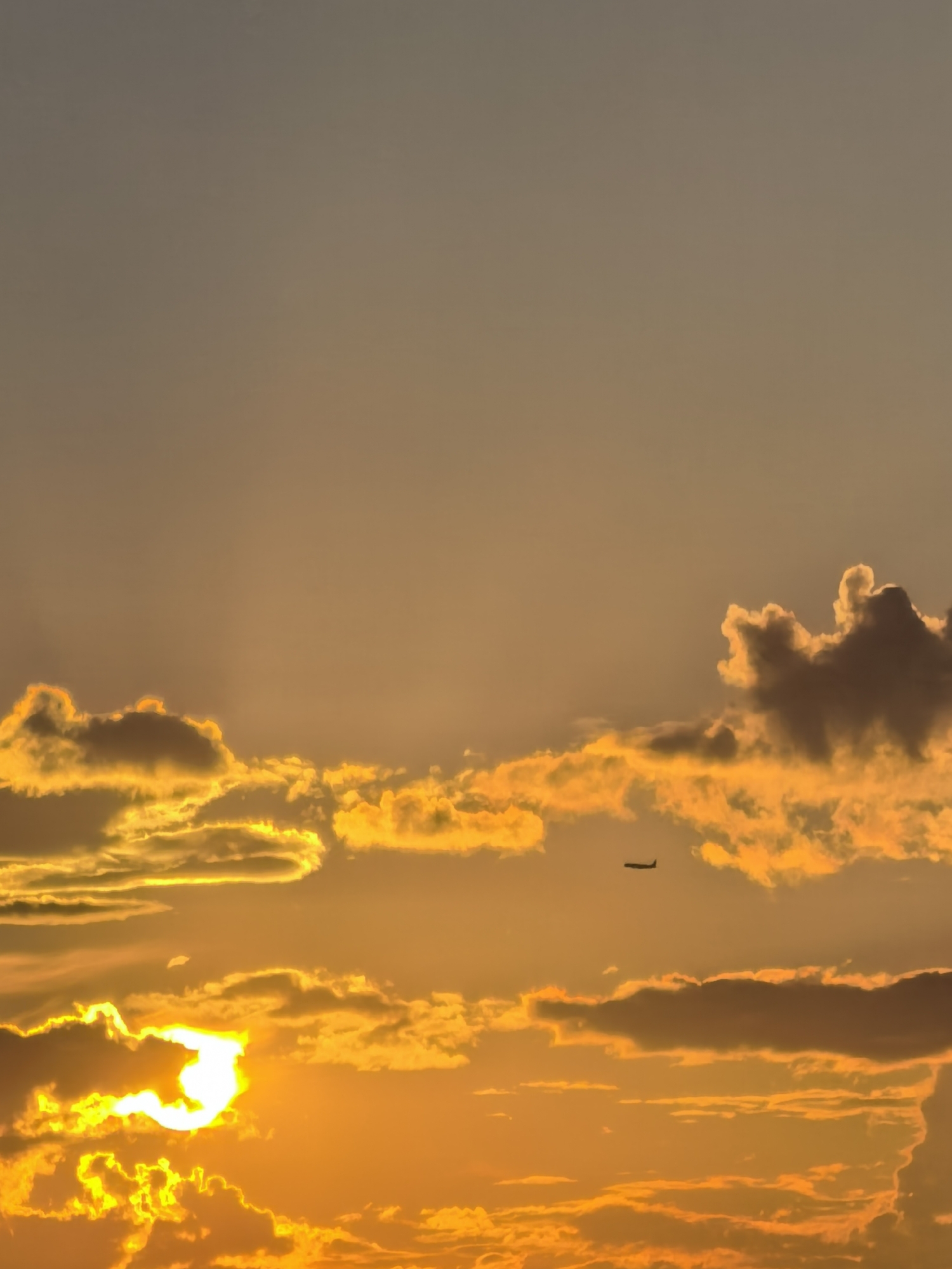 Sunset from multiple angles, clouds and warm skies all around