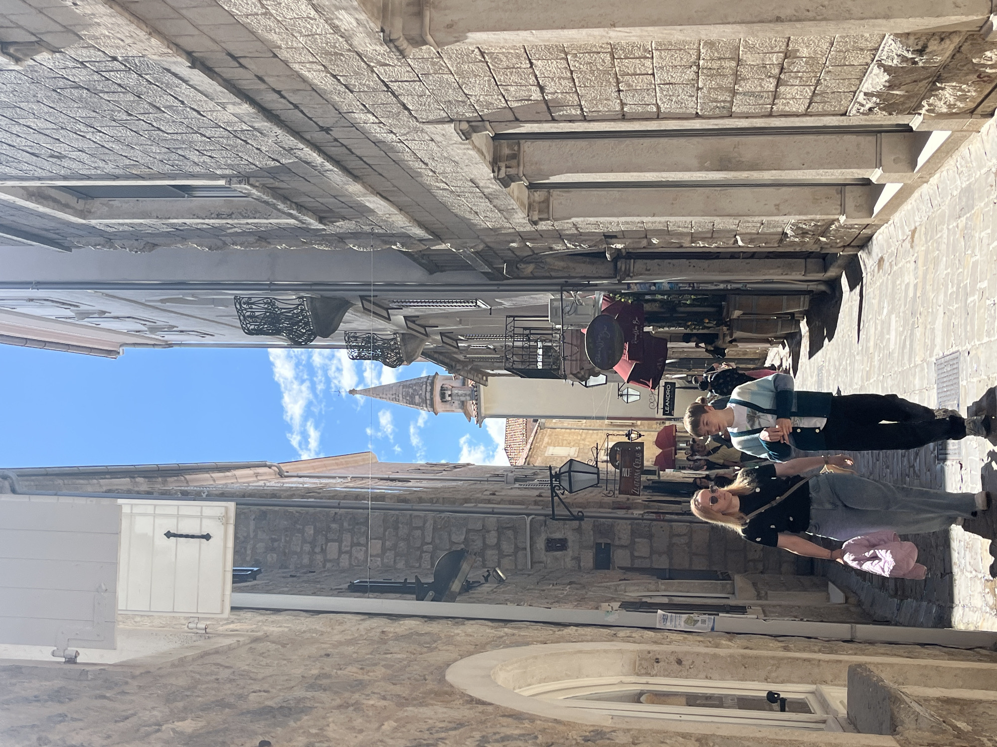 Woman with flute spotted in Budva's historic old town