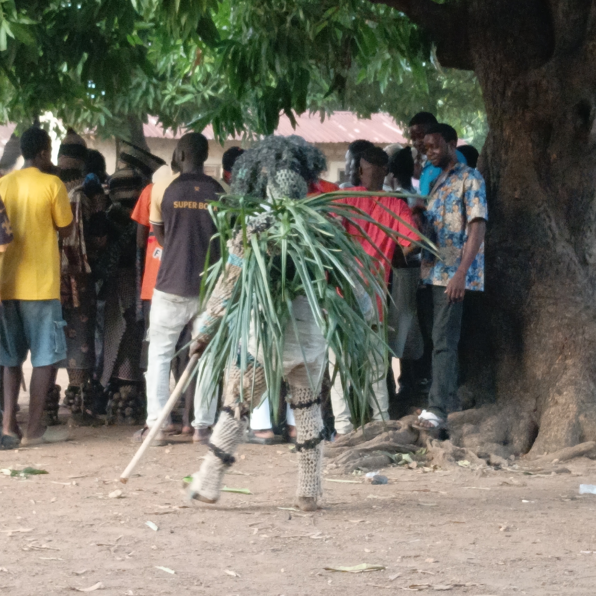 Traditional masquerade performer draws crowd in Akwanga, Nigeria