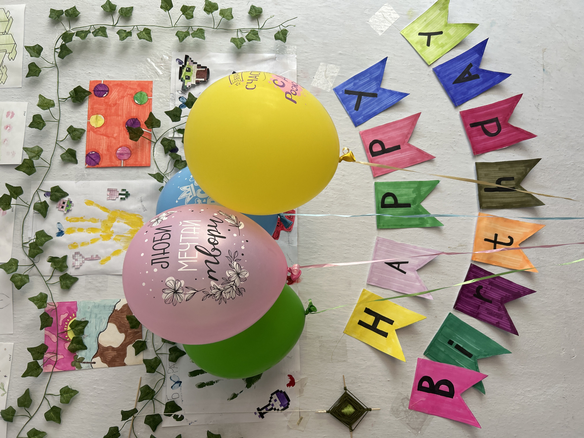 Morning birthday celebration captured in Kerch home with flowers, artwork