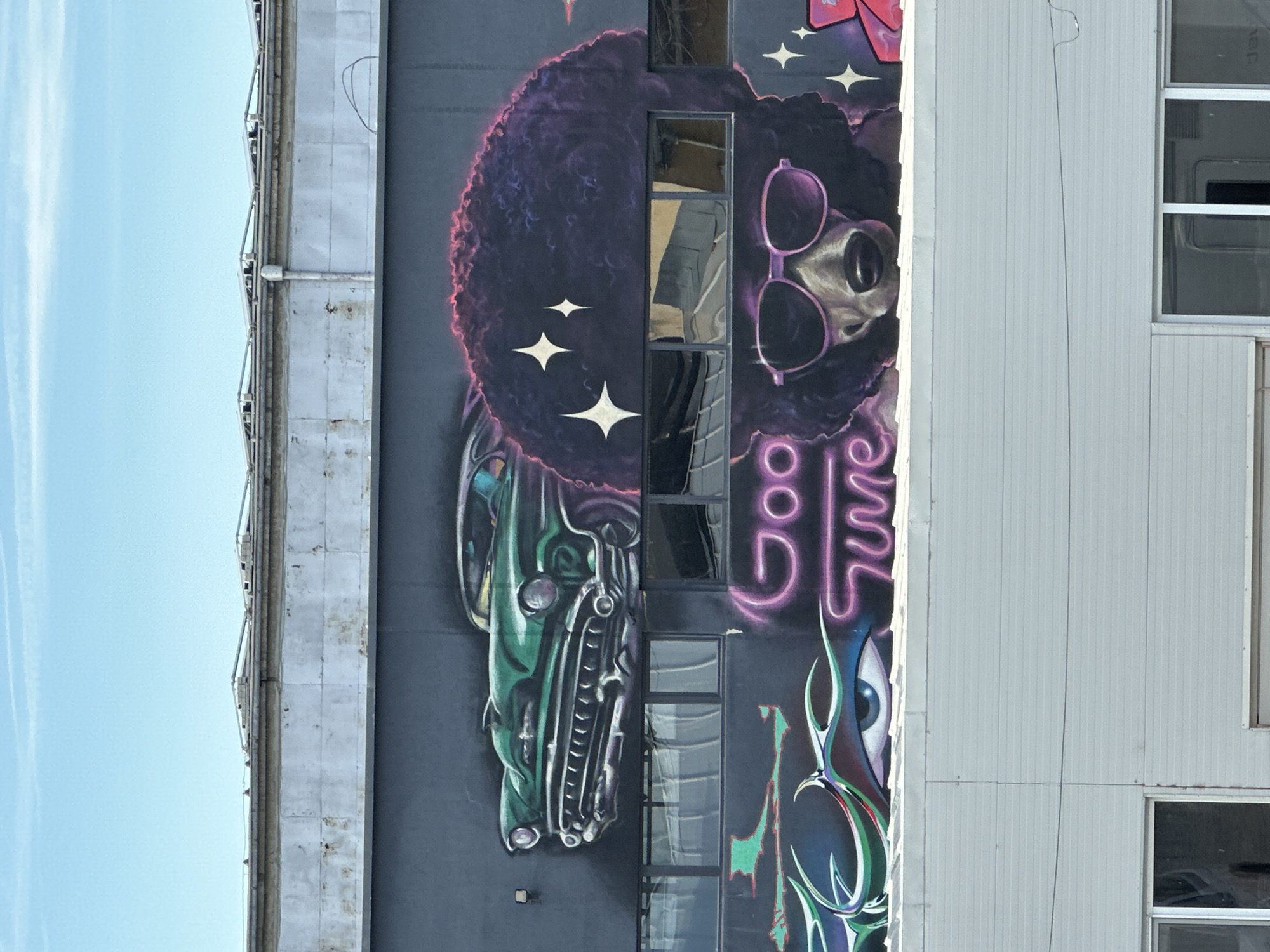 Retro mural with classic car spotted on Sofia building