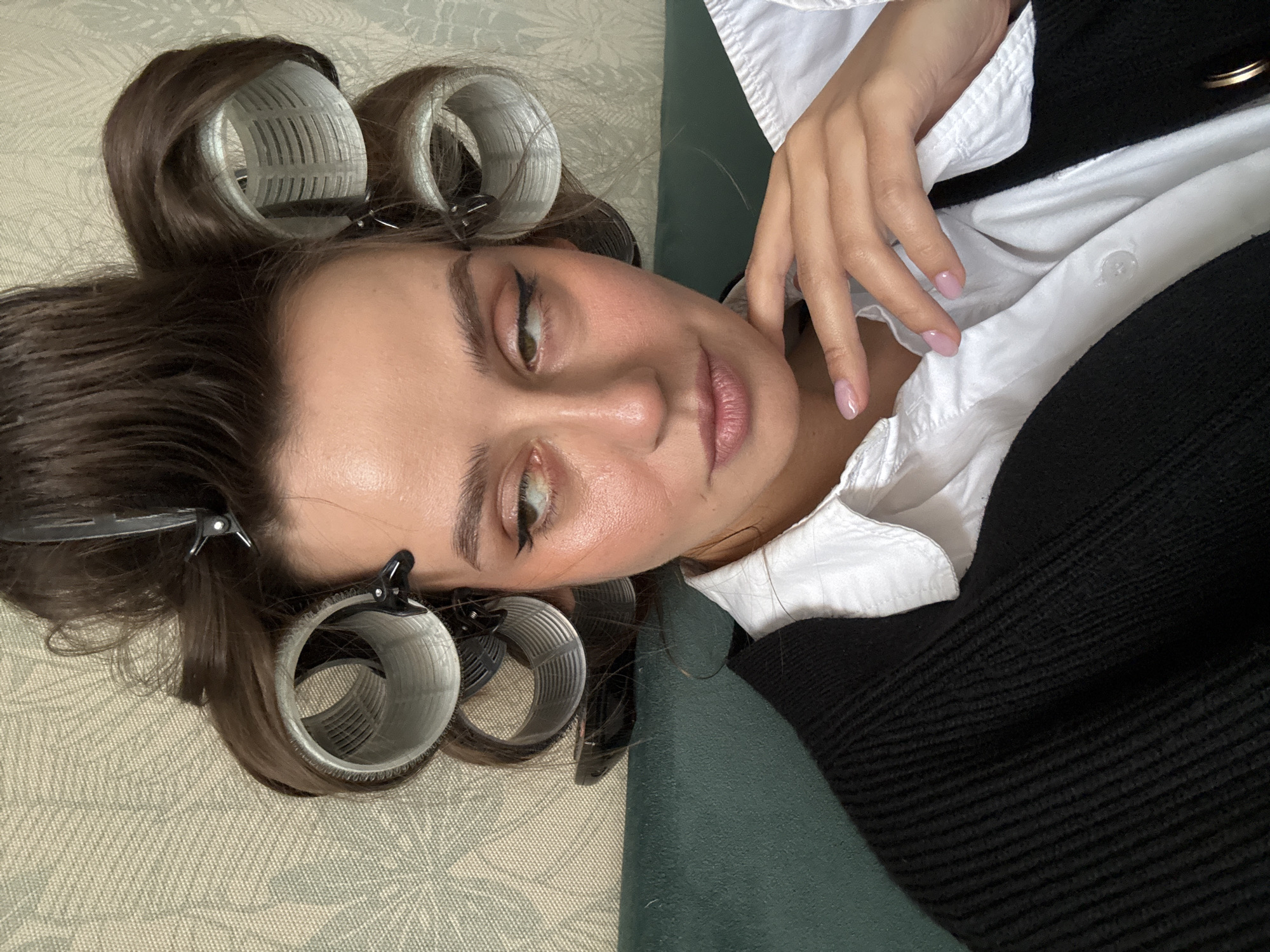 Woman's morning routine documented in Krasnoyarsk indoor settings