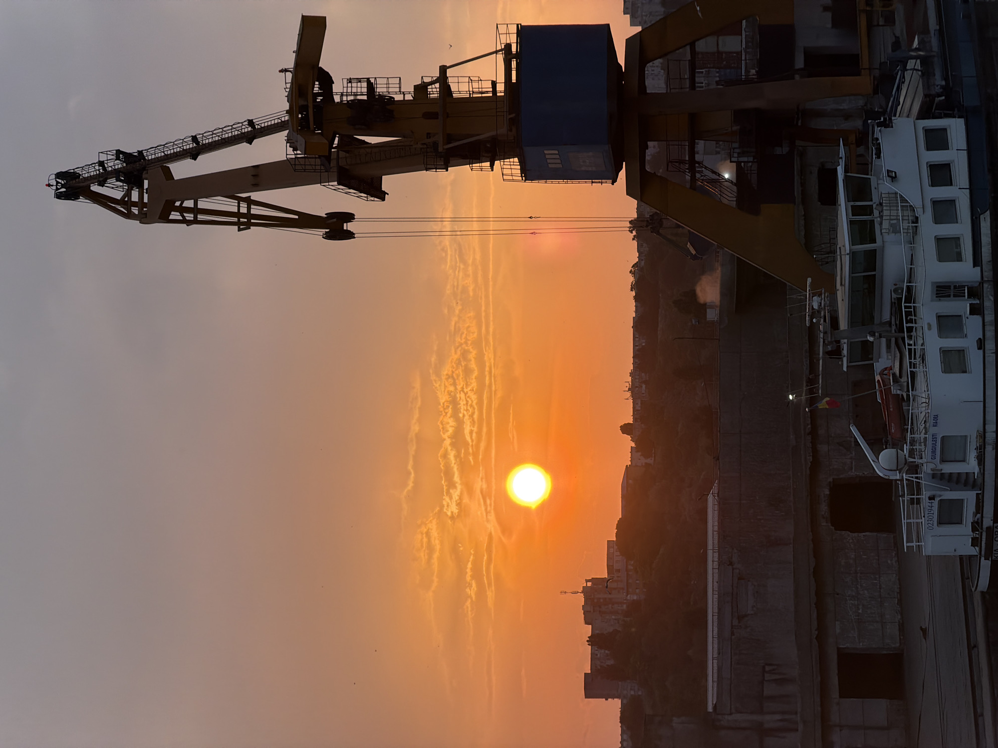 Storm sunset over Constanța's industrial harbor