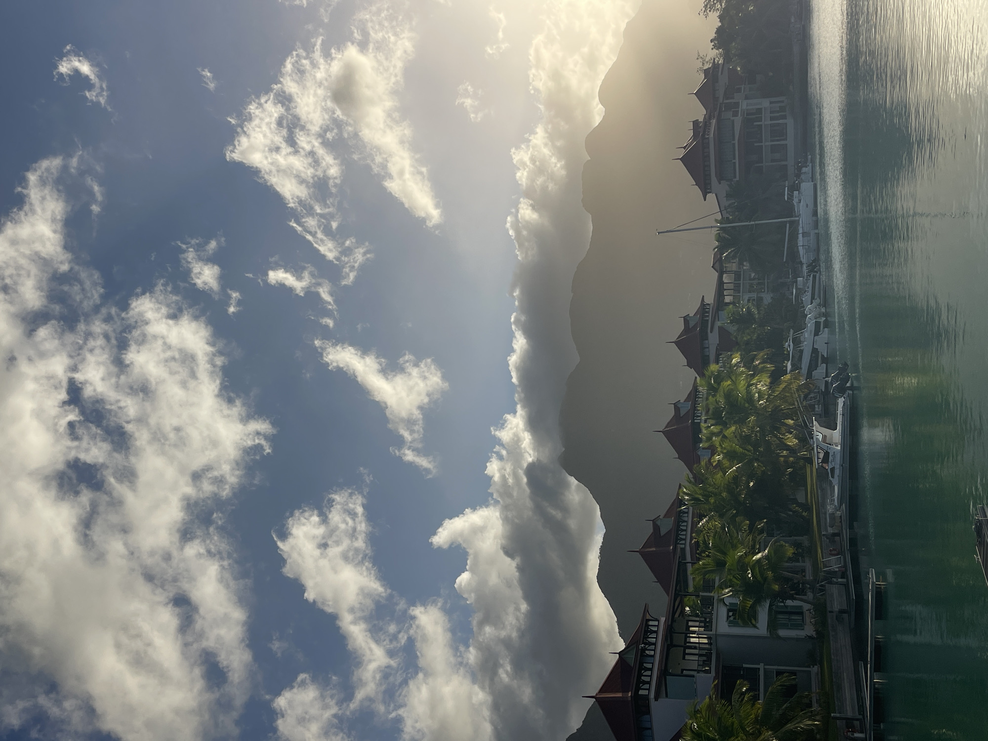 Waterfront life at a Seychelles marina on a quiet afternoon