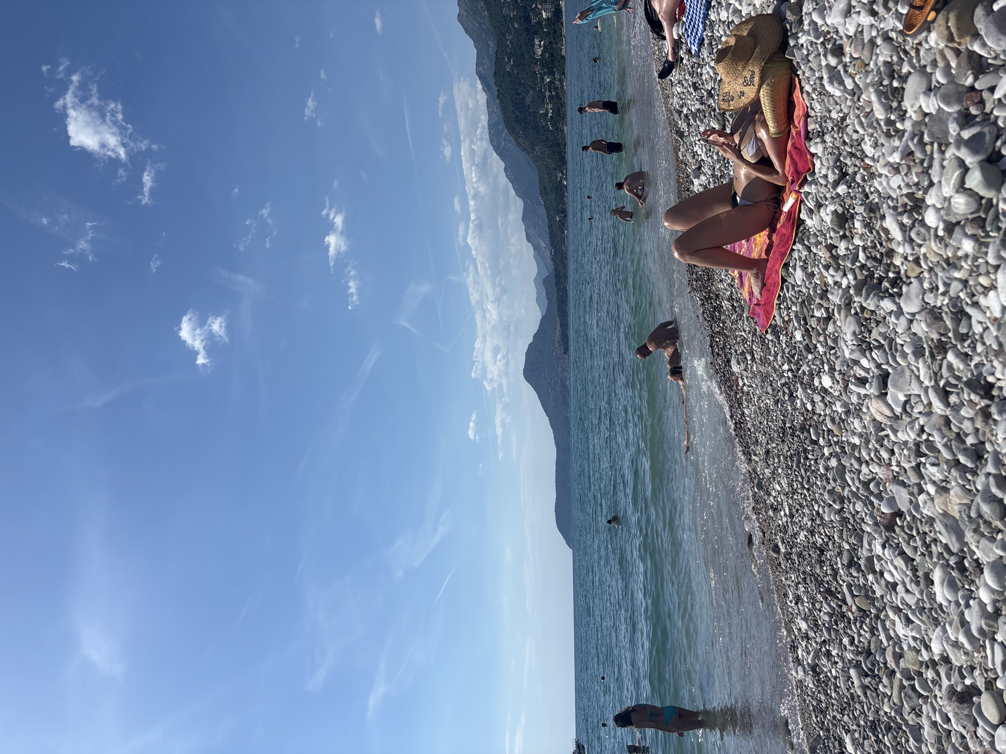 Lazy afternoon on a pebble beach in Bar, Montenegro