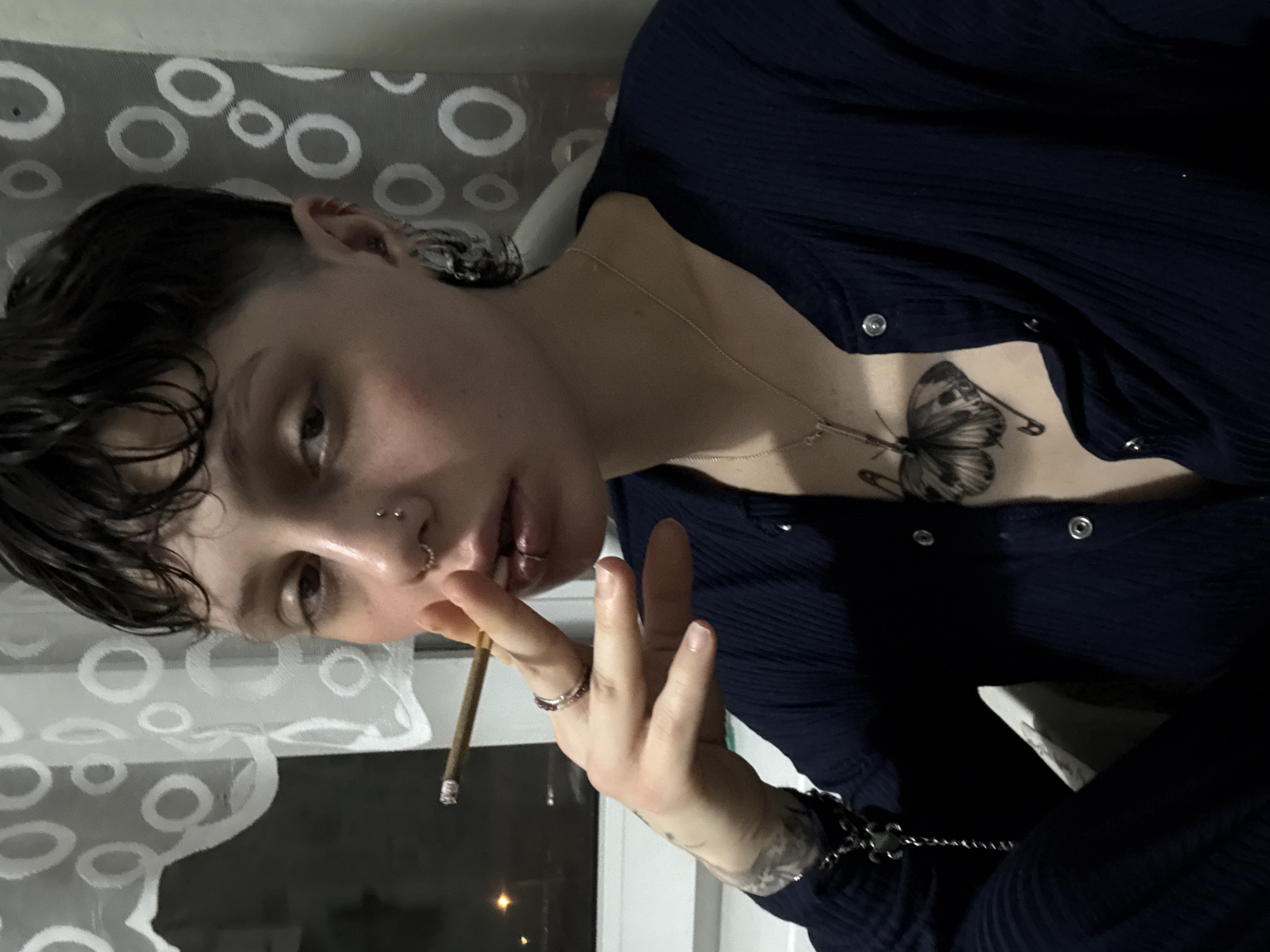 Person smoking cigarette observed in Saint Petersburg late night