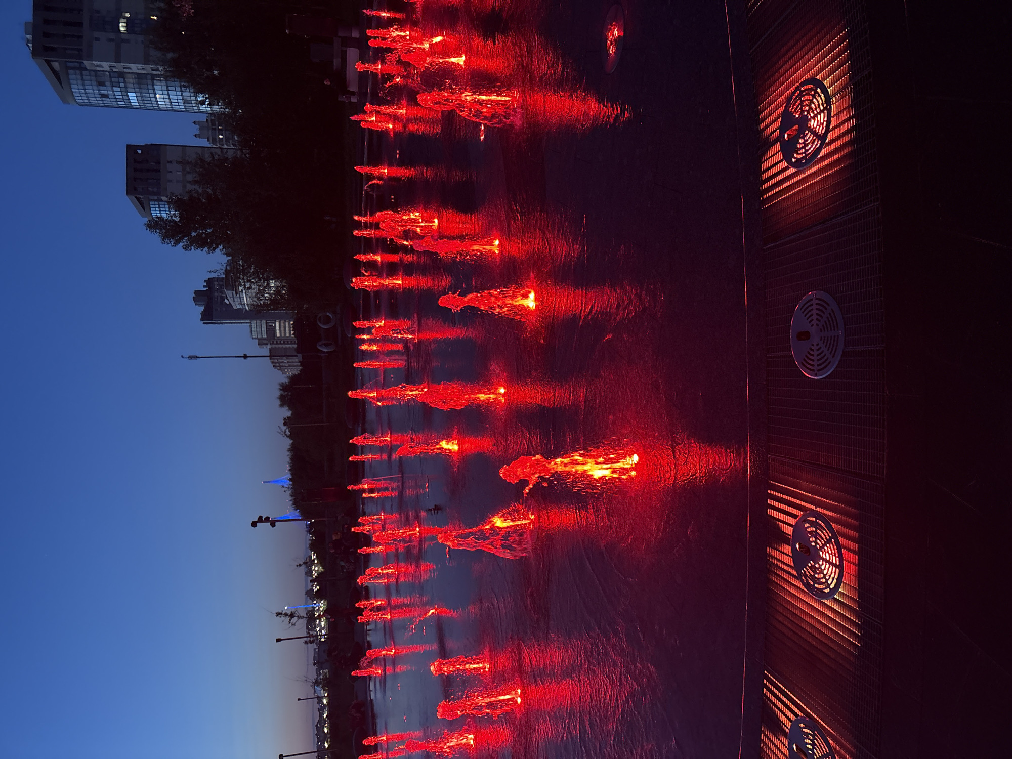 Colorful fountain light show in Saint Petersburg at dusk