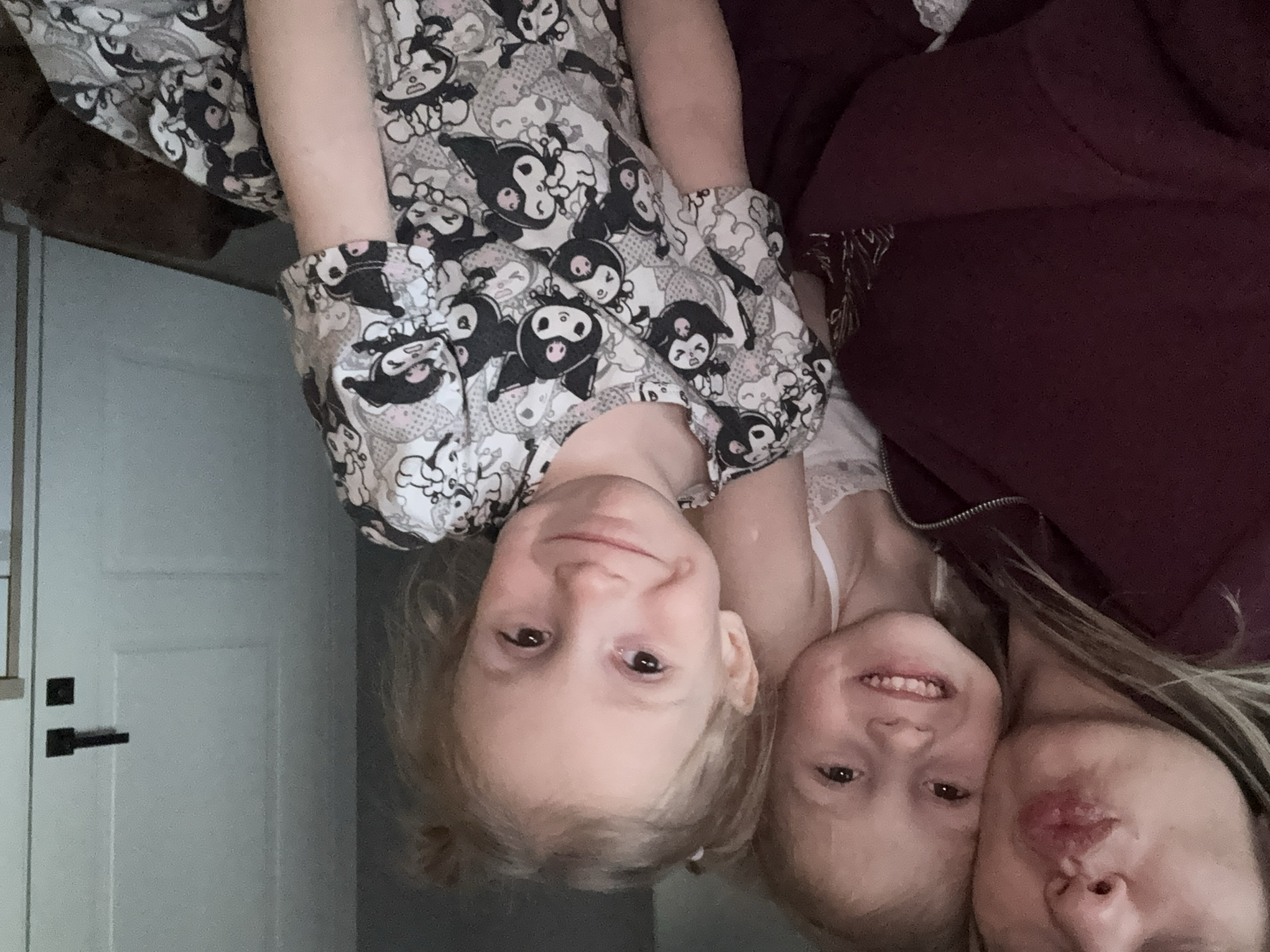Family moment captured indoors in Krasnoyarsk