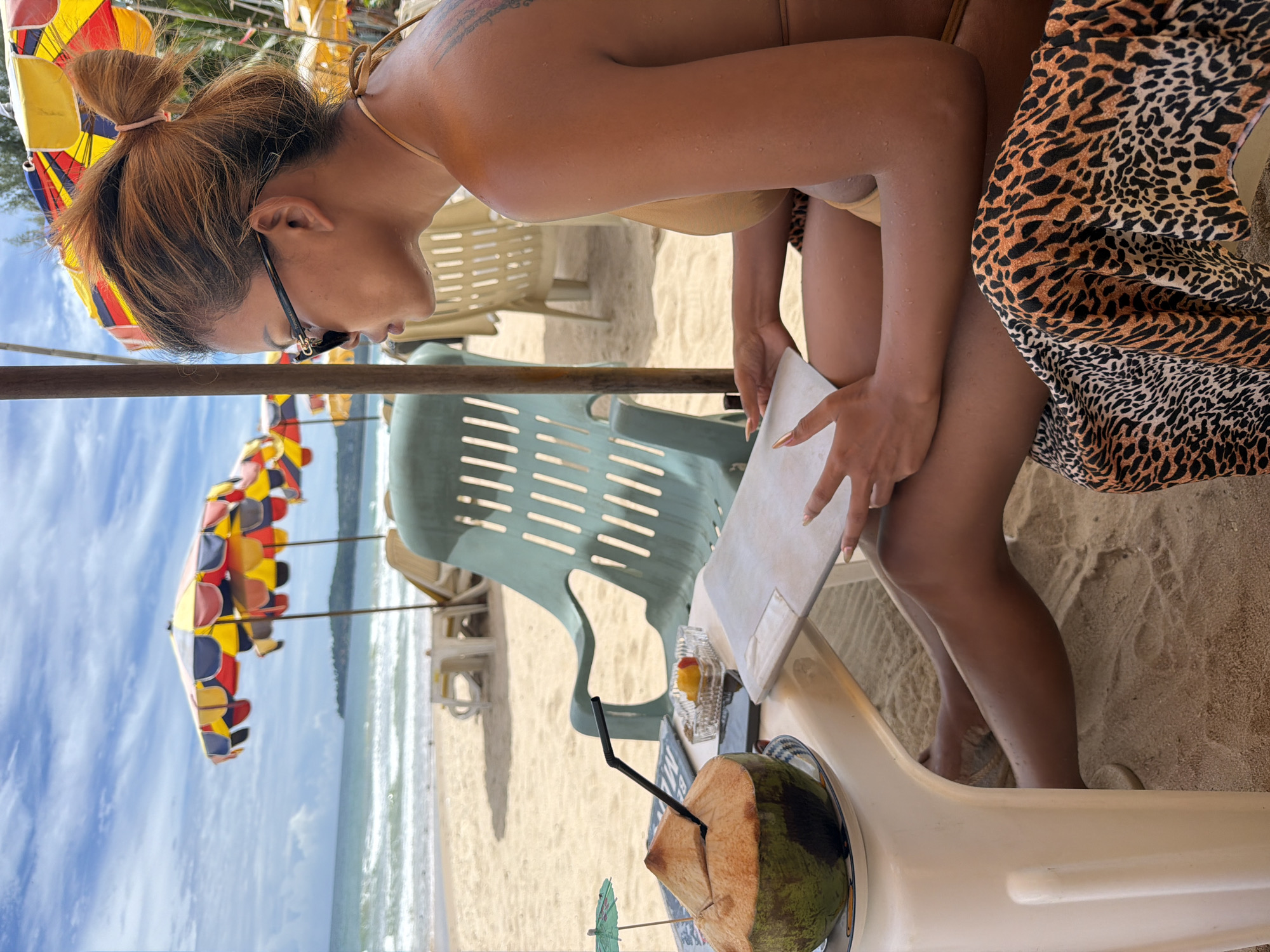 Lazy afternoon on a Choeng Thale beach with umbrellas and chairs