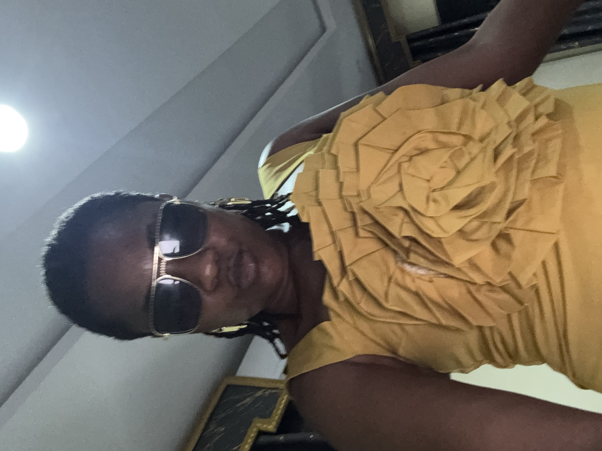 Woman in yellow dress documented across multiple Ajara locations