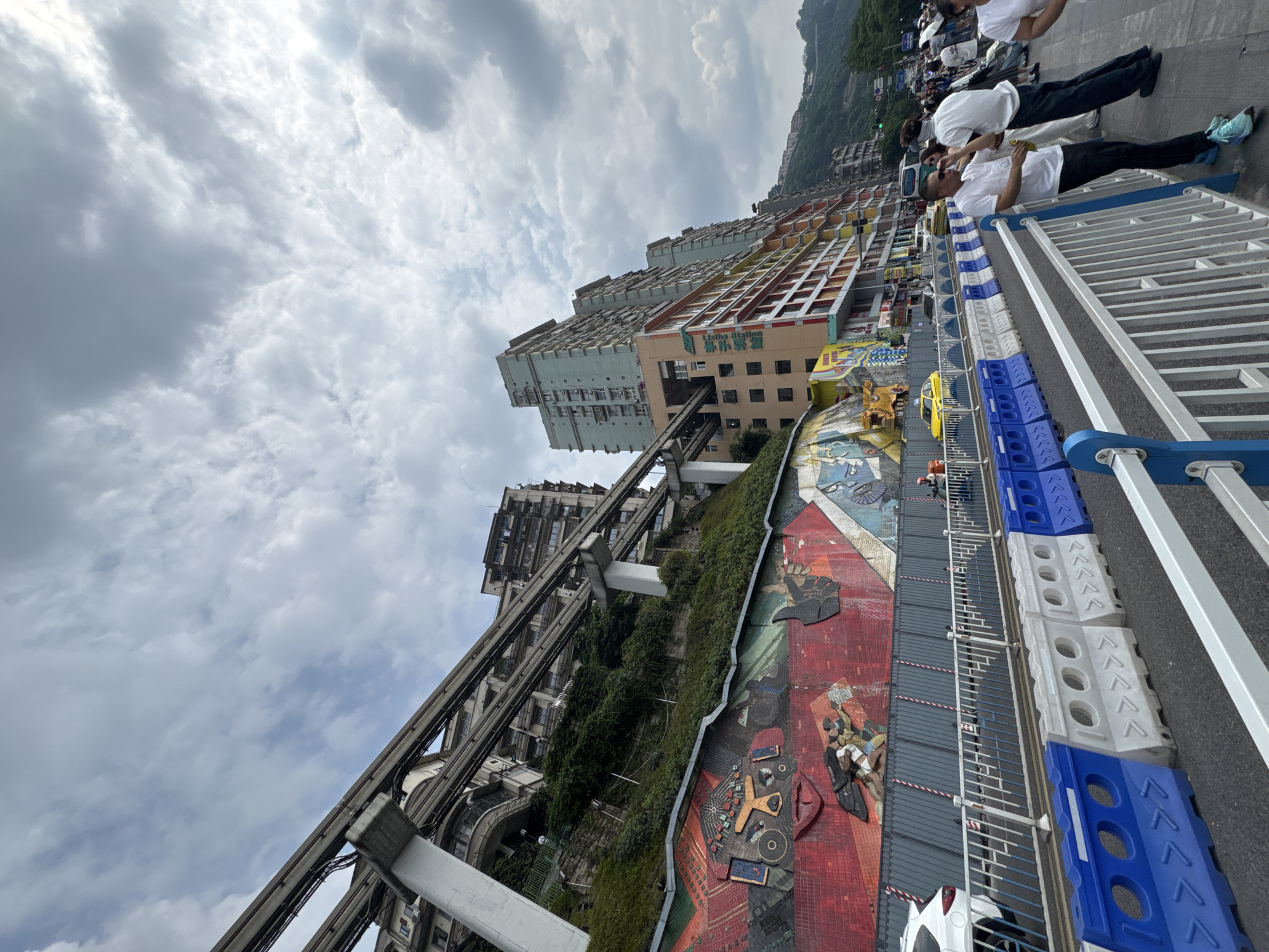 Morning scenes captured around Chongqing's Yuzhong District transit areas