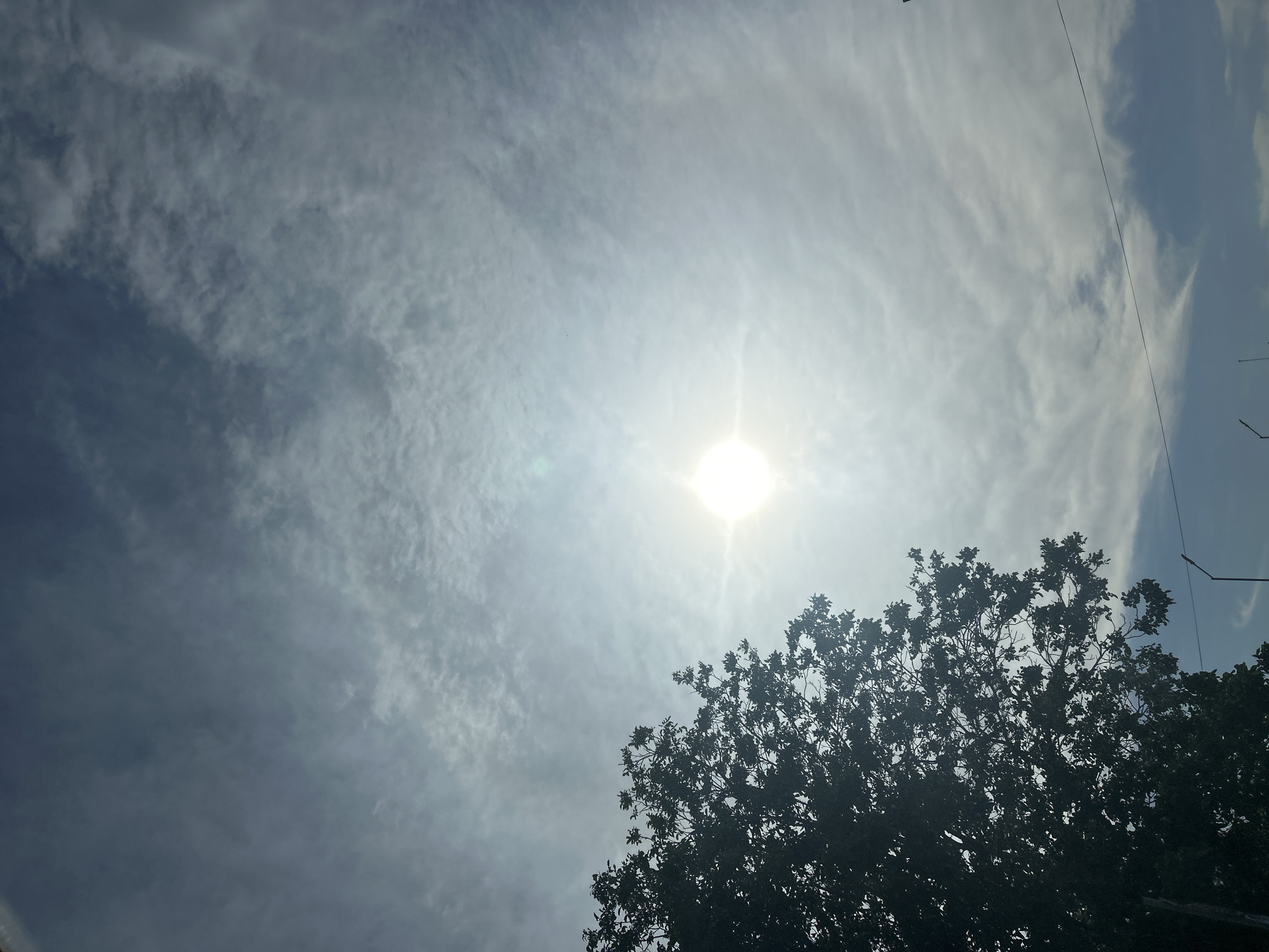 Sunny afternoon sky observed through clouds in Ruse, Bulgaria
