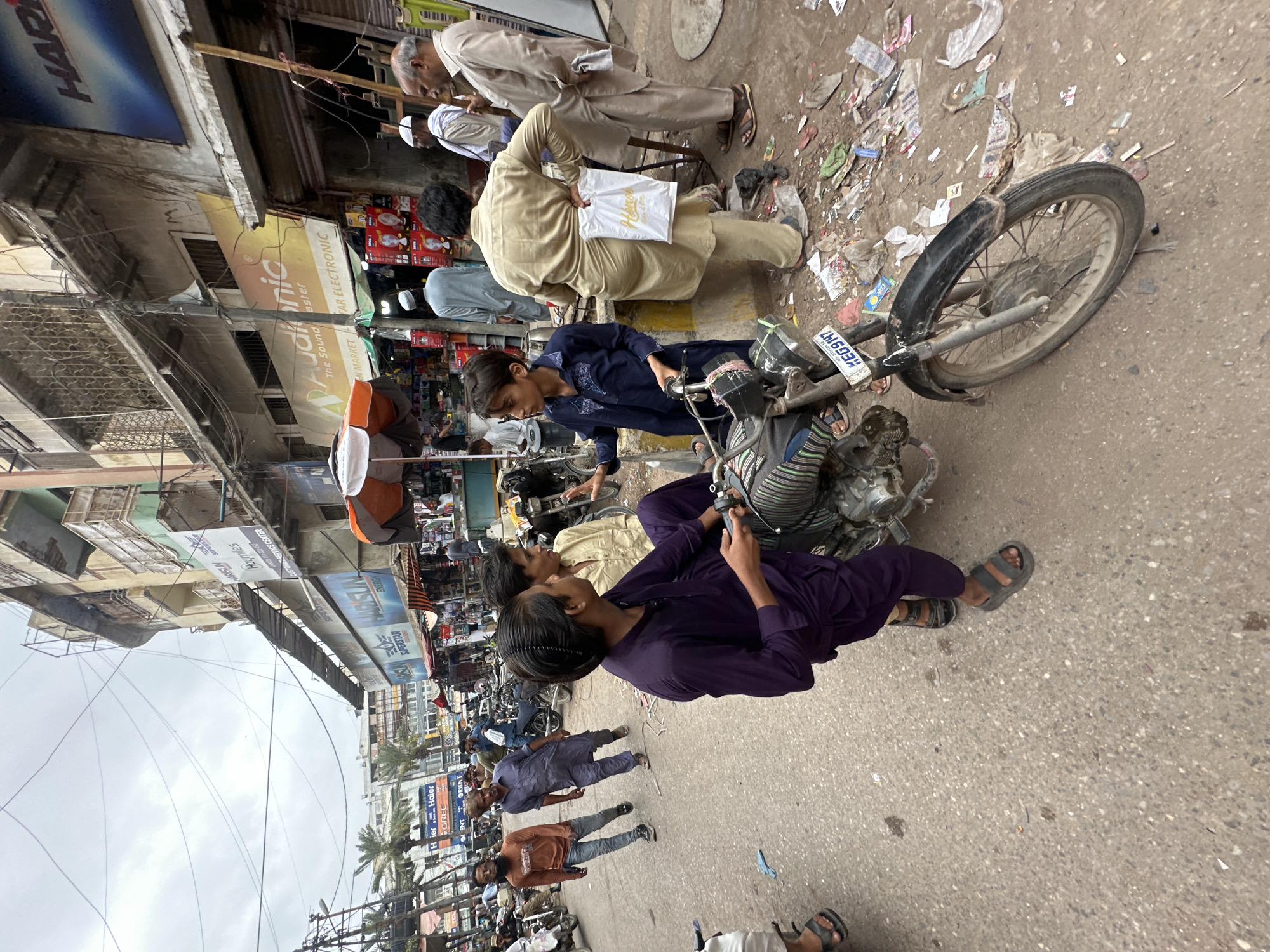 Street life and architecture in a busy Karachi marketplace