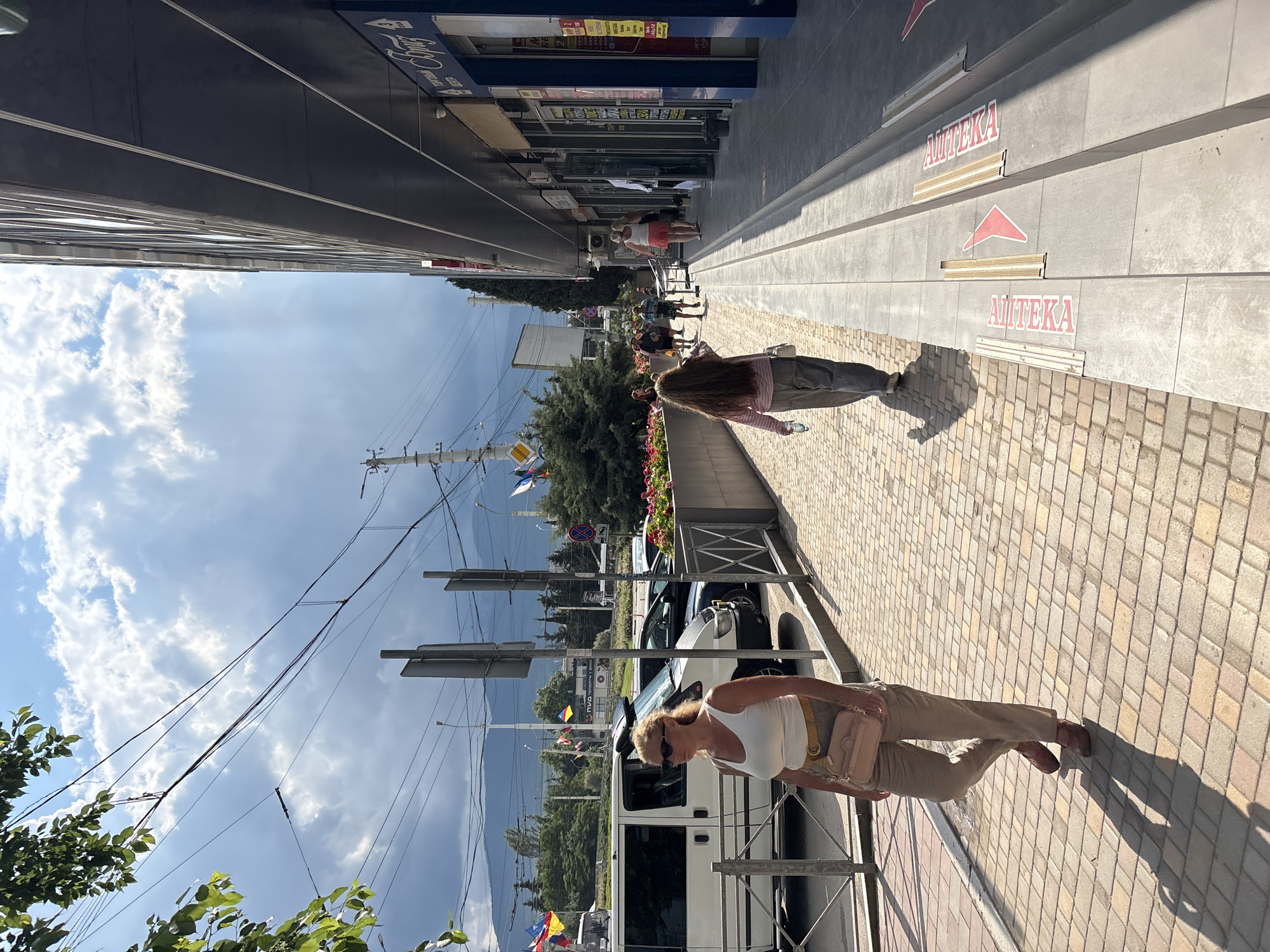 Everyday street life captured in Alushta, Ukraine midday