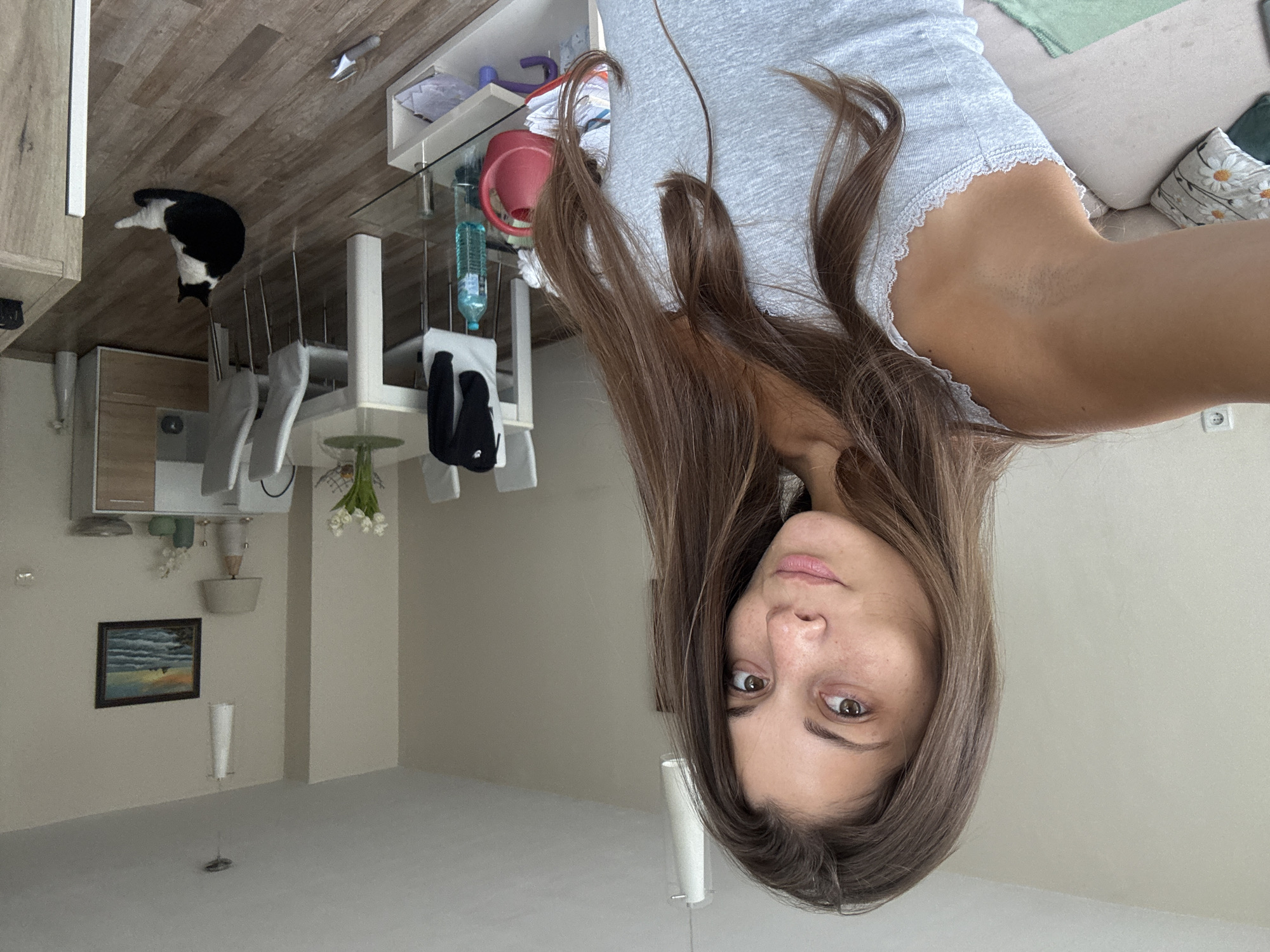 Woman shares morning routine with cat in Burgas apartment