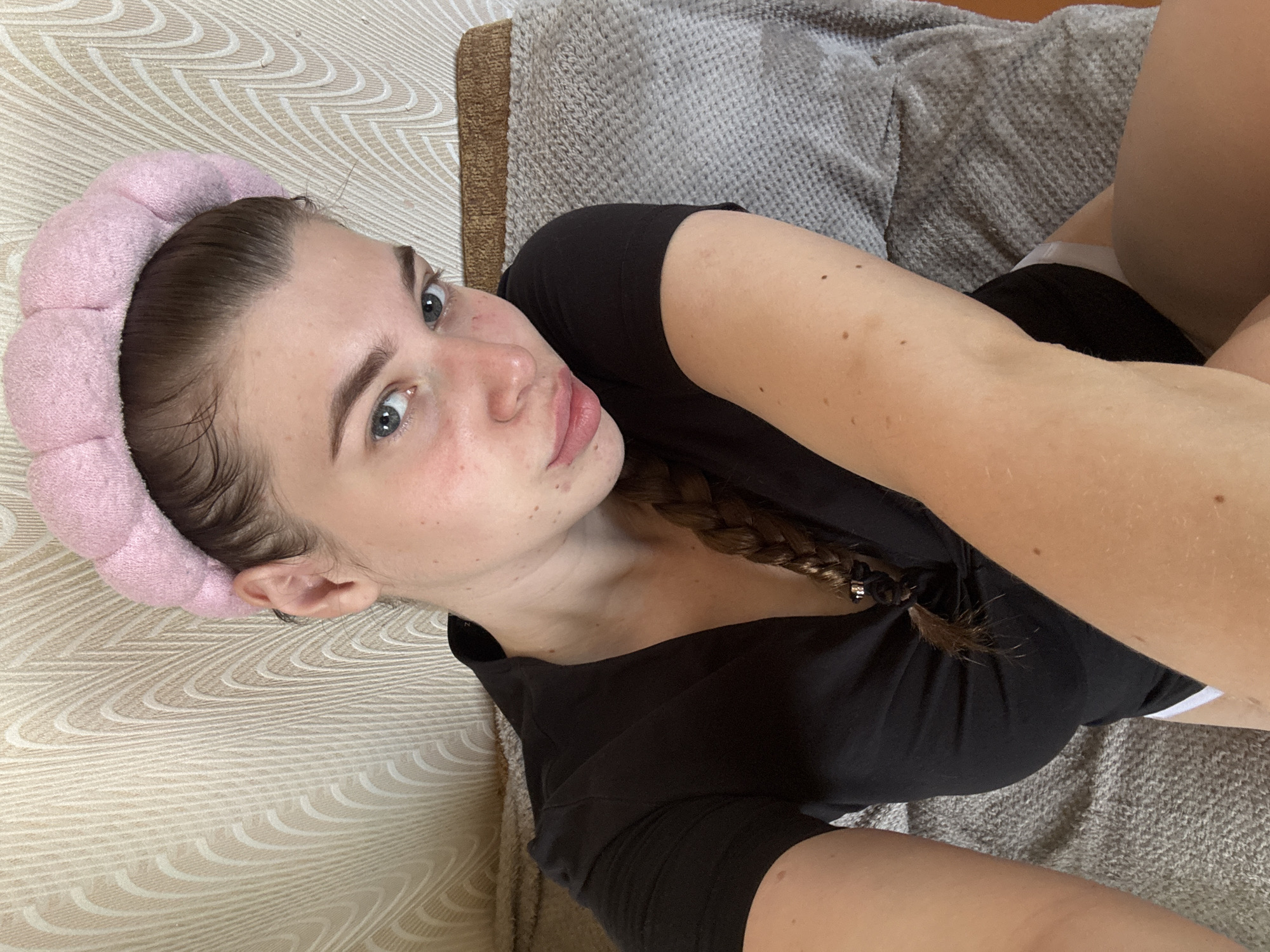 Woman documents morning skincare routine in rural Russian home