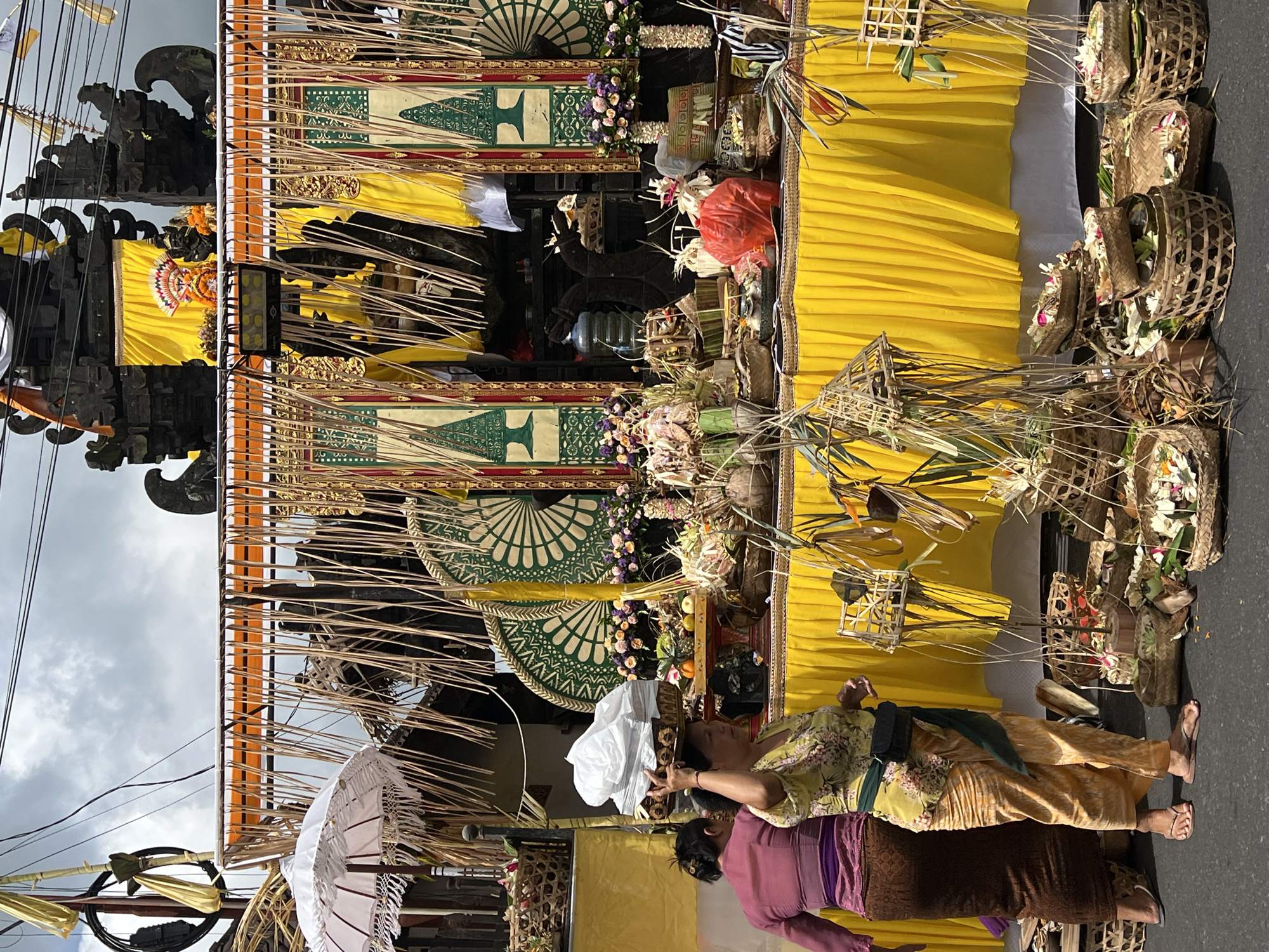 Balinese Hindu ceremony observed in Tegallalang with traditional offerings
