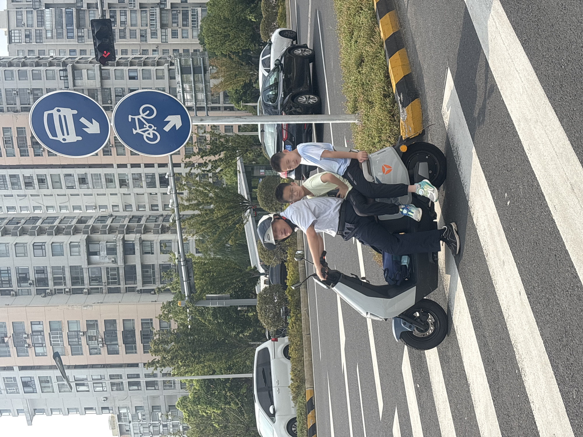 Morning street activity at a Suzhou Industrial Park intersection