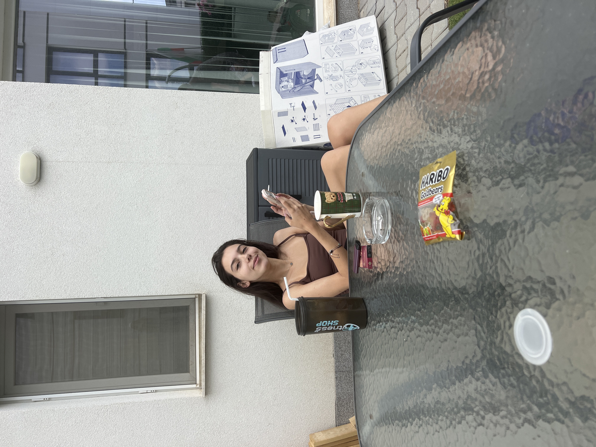Afternoon hangout at a modern apartment complex with a dog