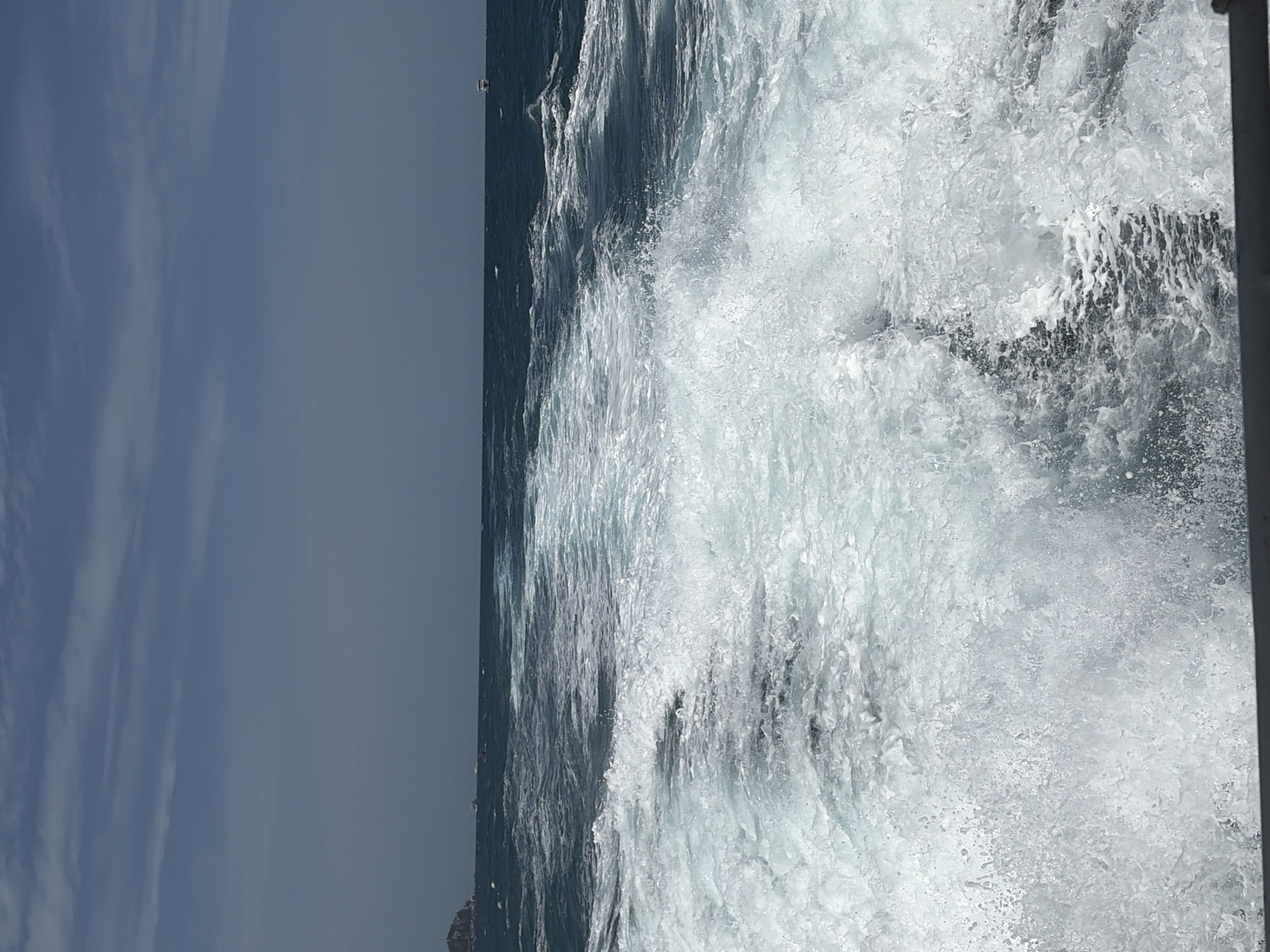 Boat transit through Ko Pha-ngan waters, islands in the distance