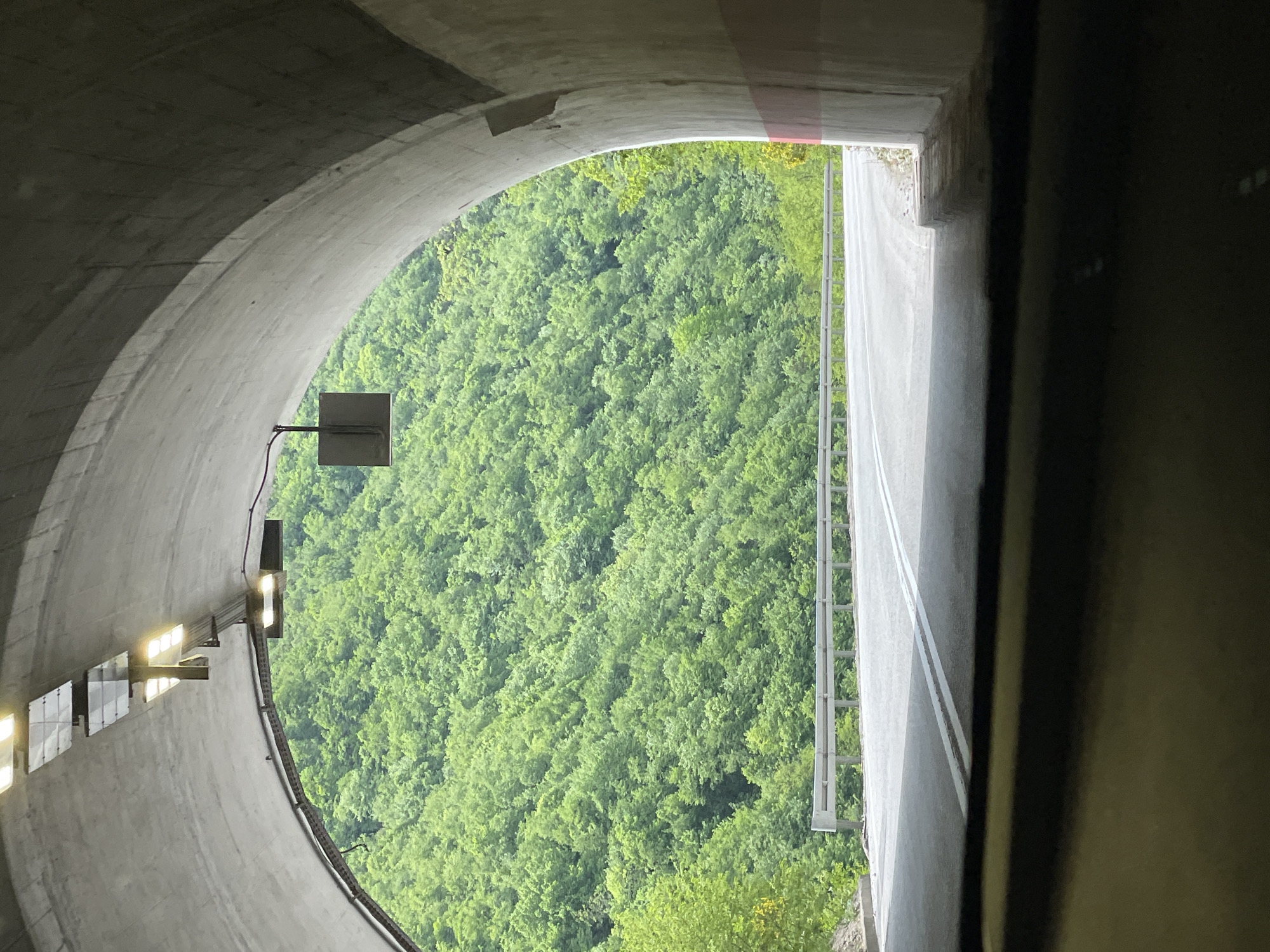 Tunnel view captured in Baljvine shows green hillside beyond