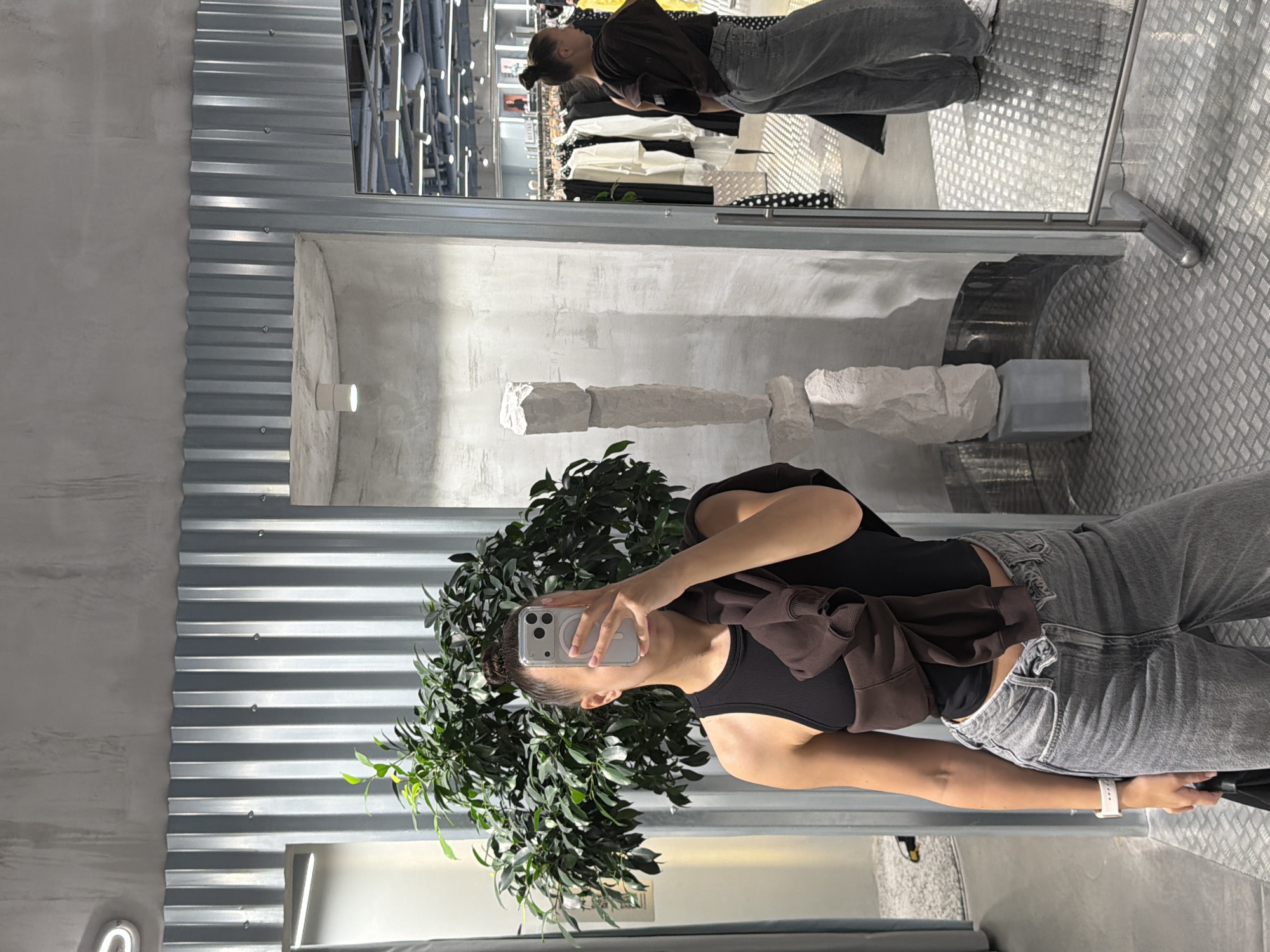 Fitting room mirror selfies at a Moscow boutique