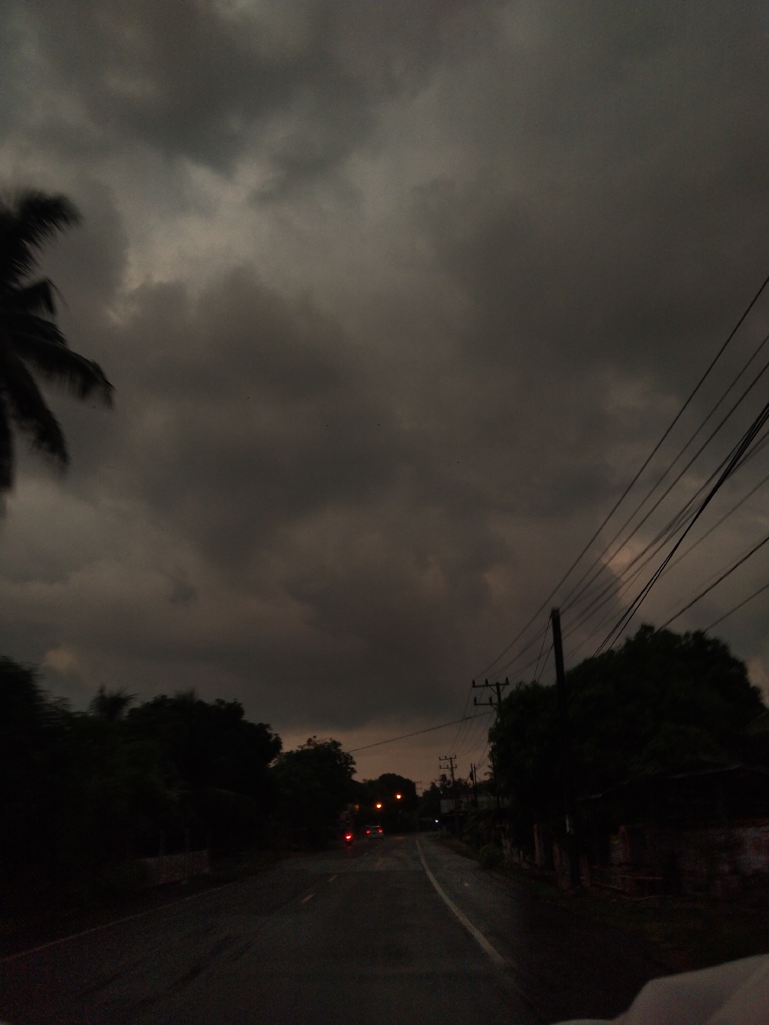 Overcast skies observed over Bateiiliek, Indonesia street scene