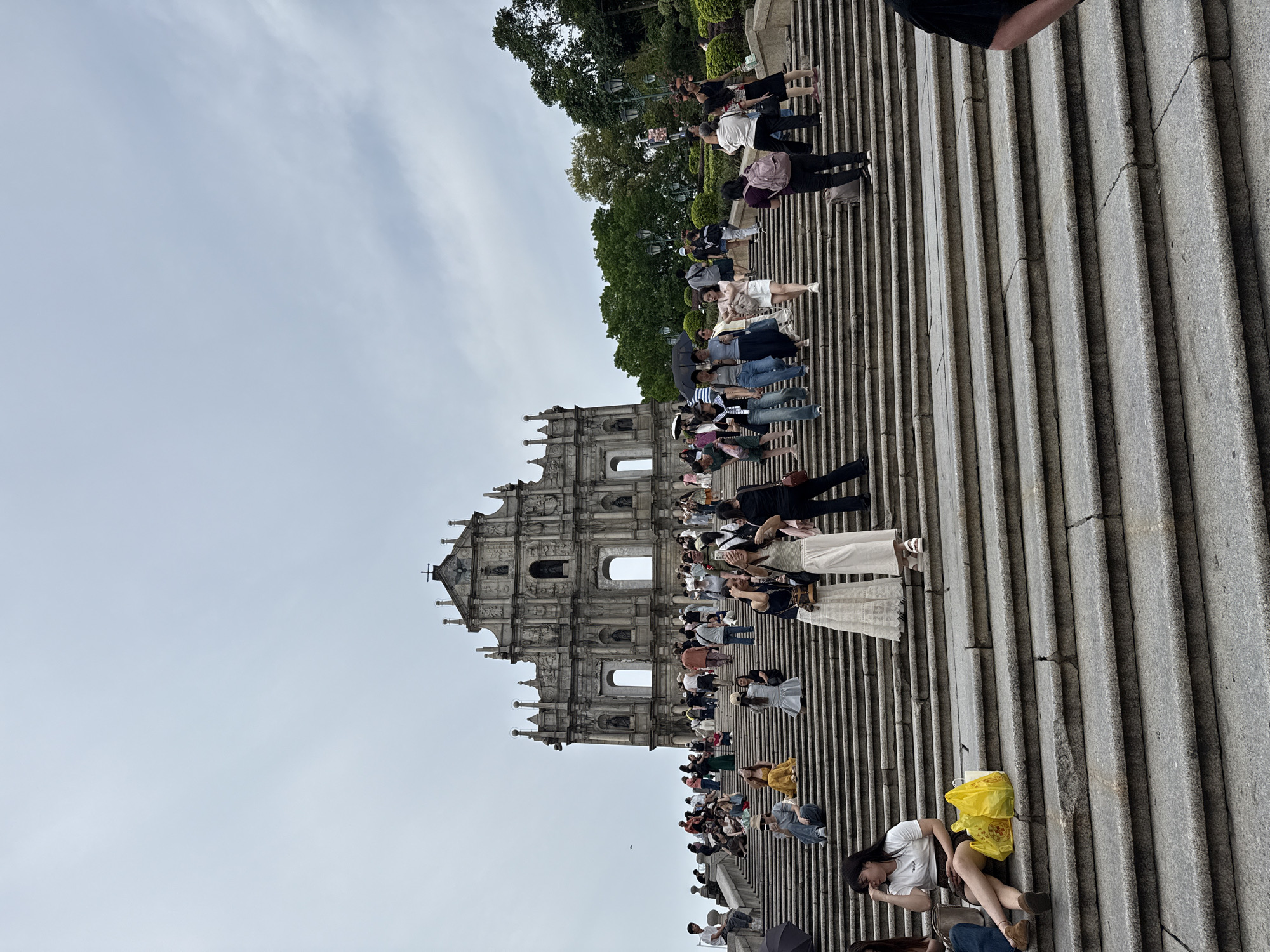 Tourist crowds gather at historic St. Paul's Ruins in Macau