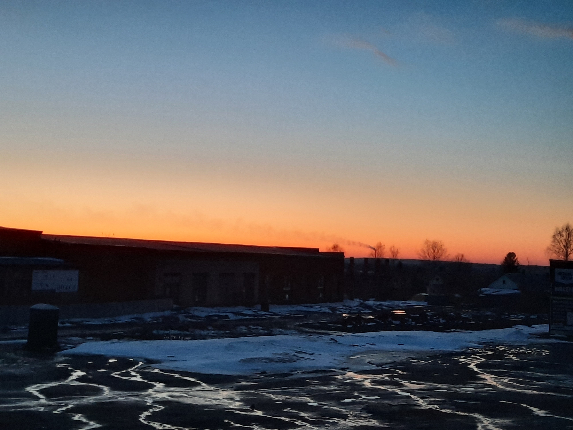 Spring twilight observed in Krasnogorskoye with snow patches remaining