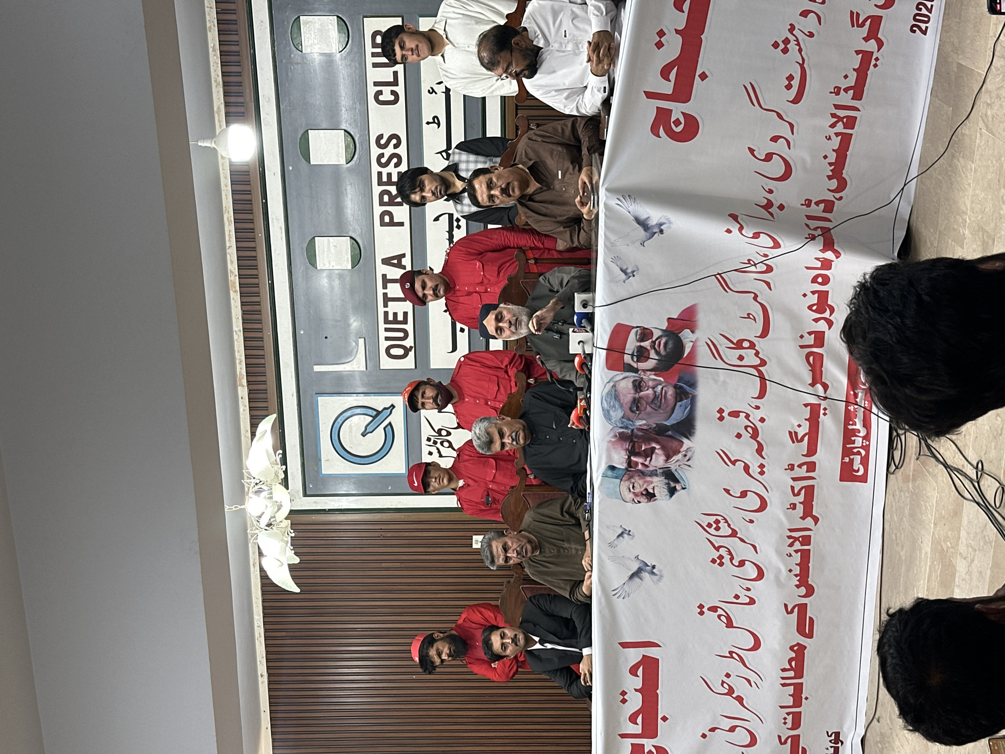 Press conference with protest banners at Quetta Press Club