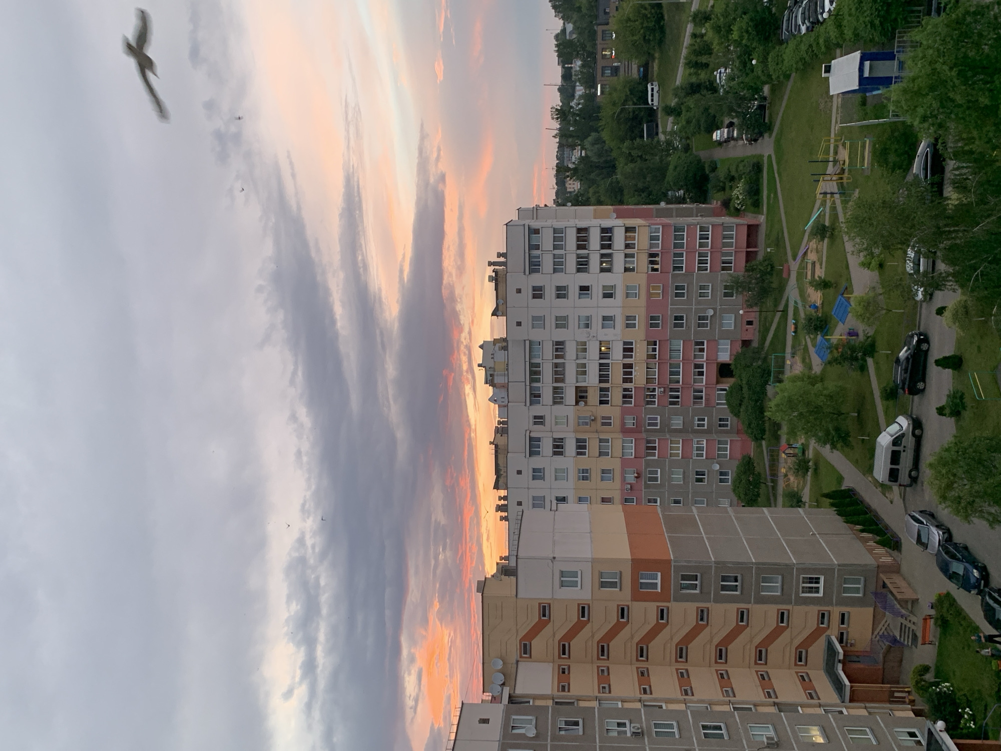 Sunset light breaks over Hrodna apartment blocks