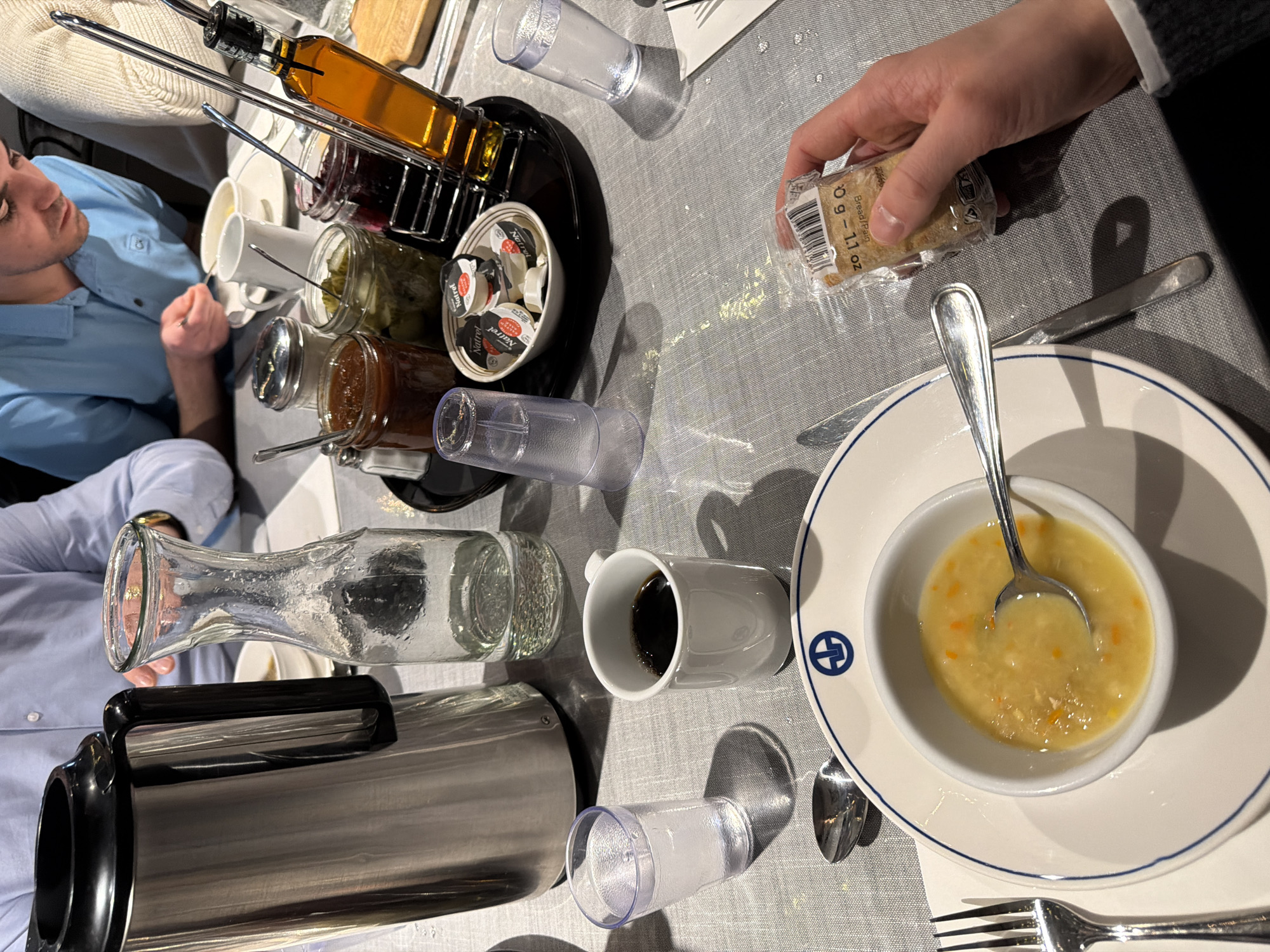 Man enjoys breakfast with condiments in Mirabel