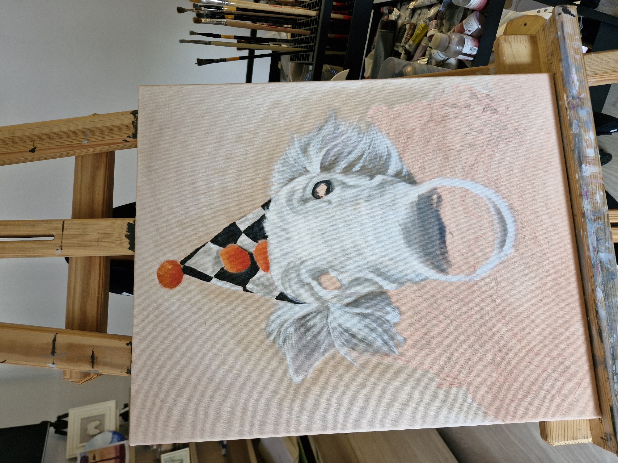 Artist studio captures dog portrait and urban paintings