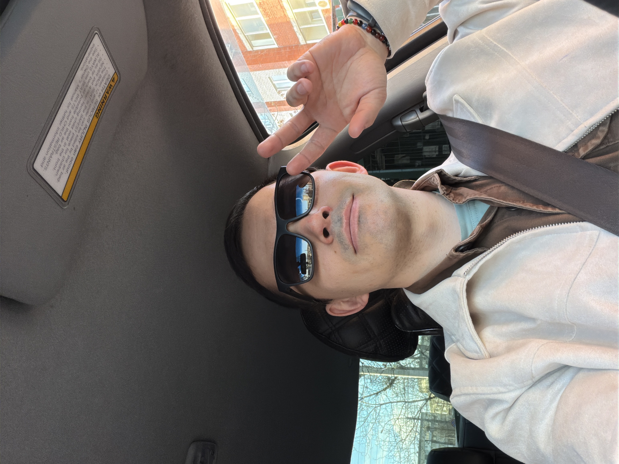 Man takes selfies in car during daytime in Izhevsk